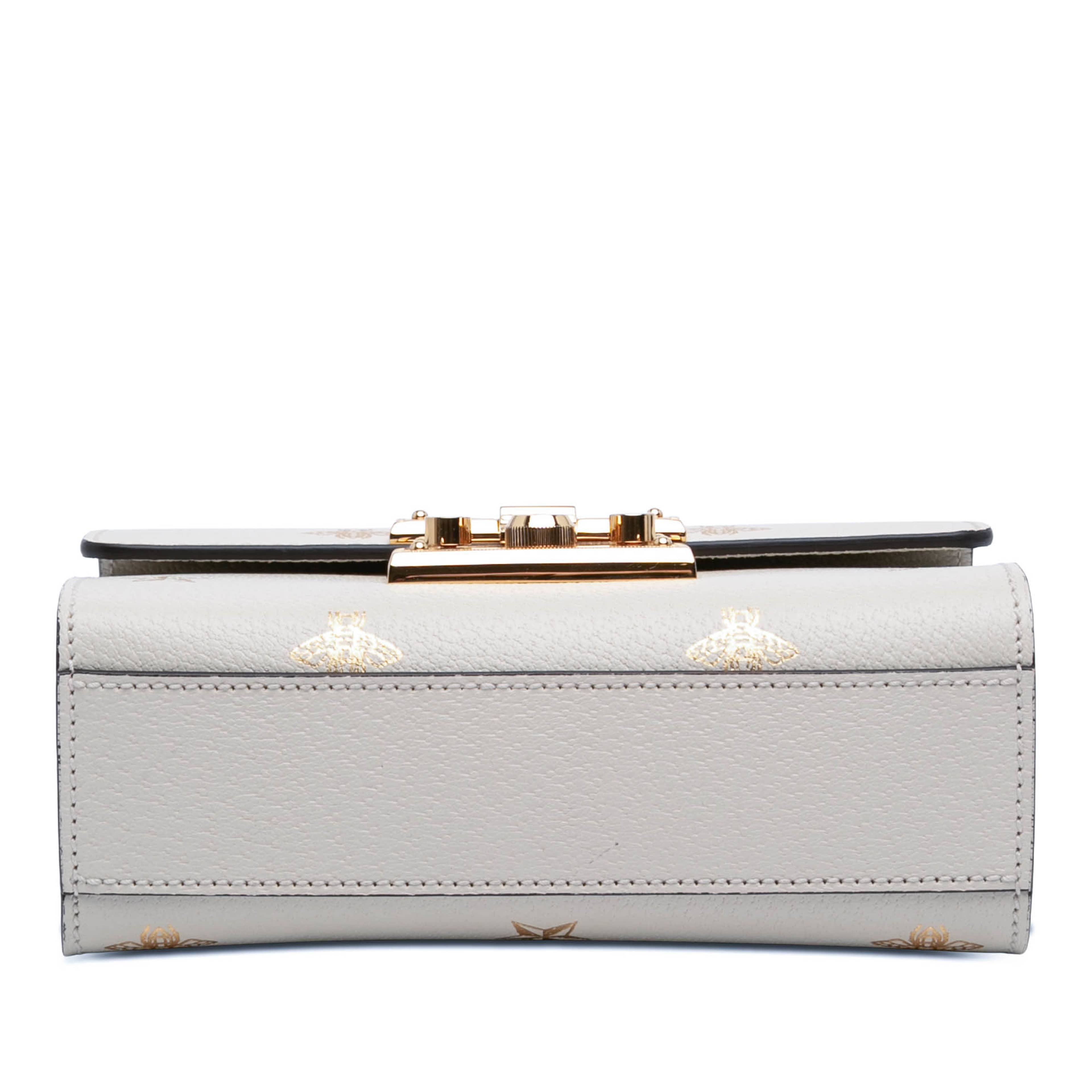 Gucci Small Leather Bee Star Padlock Crossbody, från Luxclusif, i färgen vit. Klicka för att öppna bilden i stort format