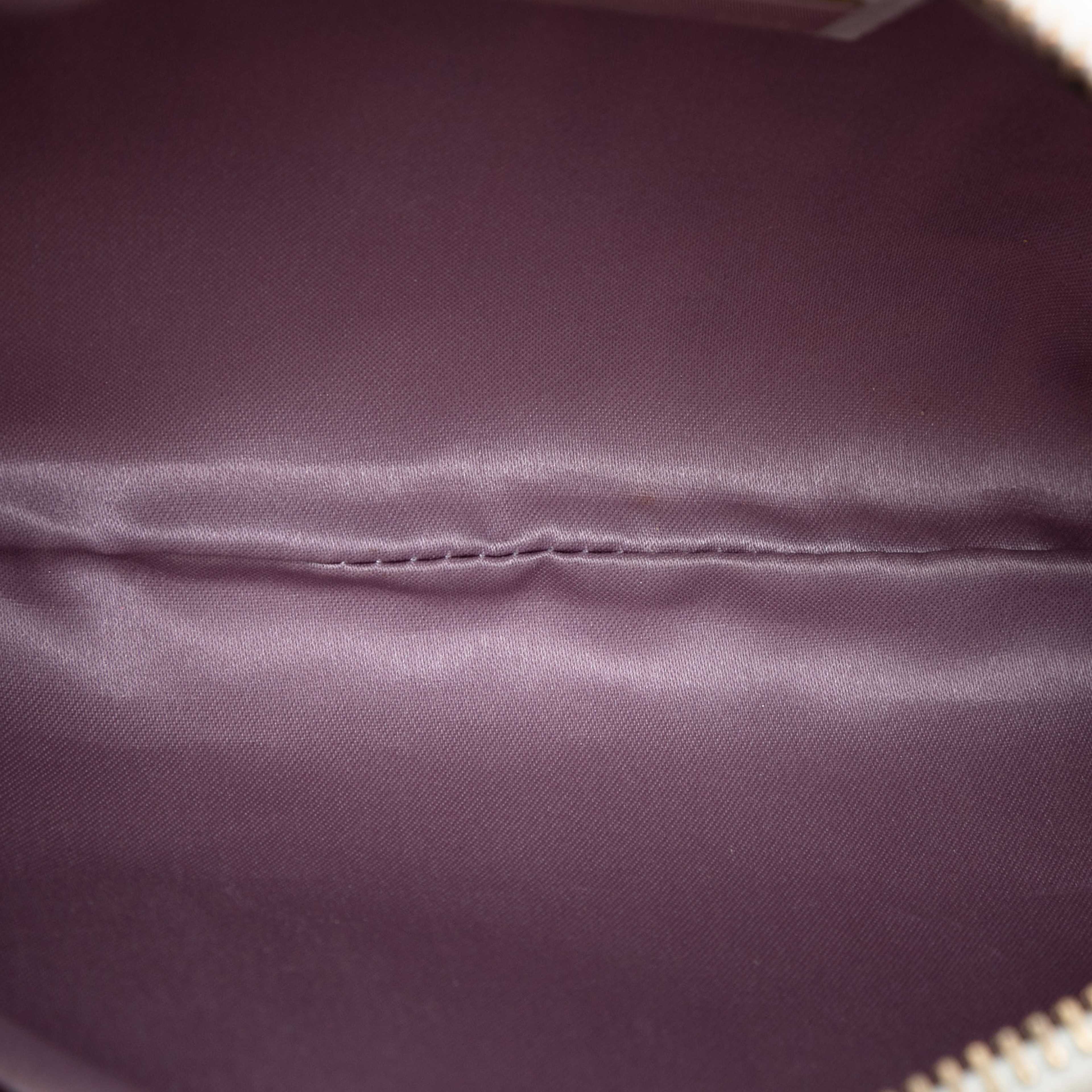 Fendi Zucca Canvas Pochette, från Luxclusif, i färgen light purple. Klicka för att öppna bilden i stort format