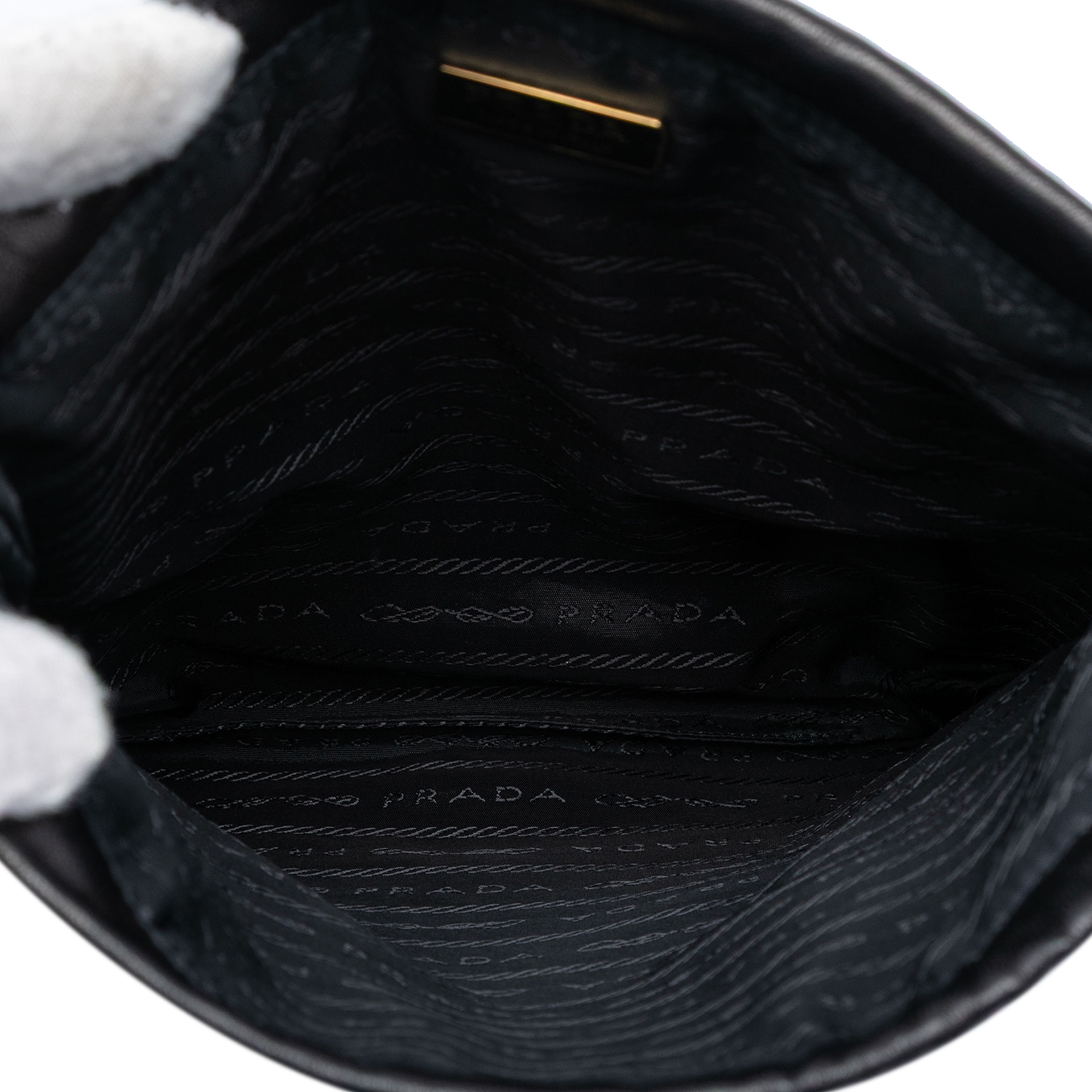 Prada Embroidered Leather Drawstring Pouch, från Luxclusif, i färgen black. Klicka för att öppna bilden i stort format
