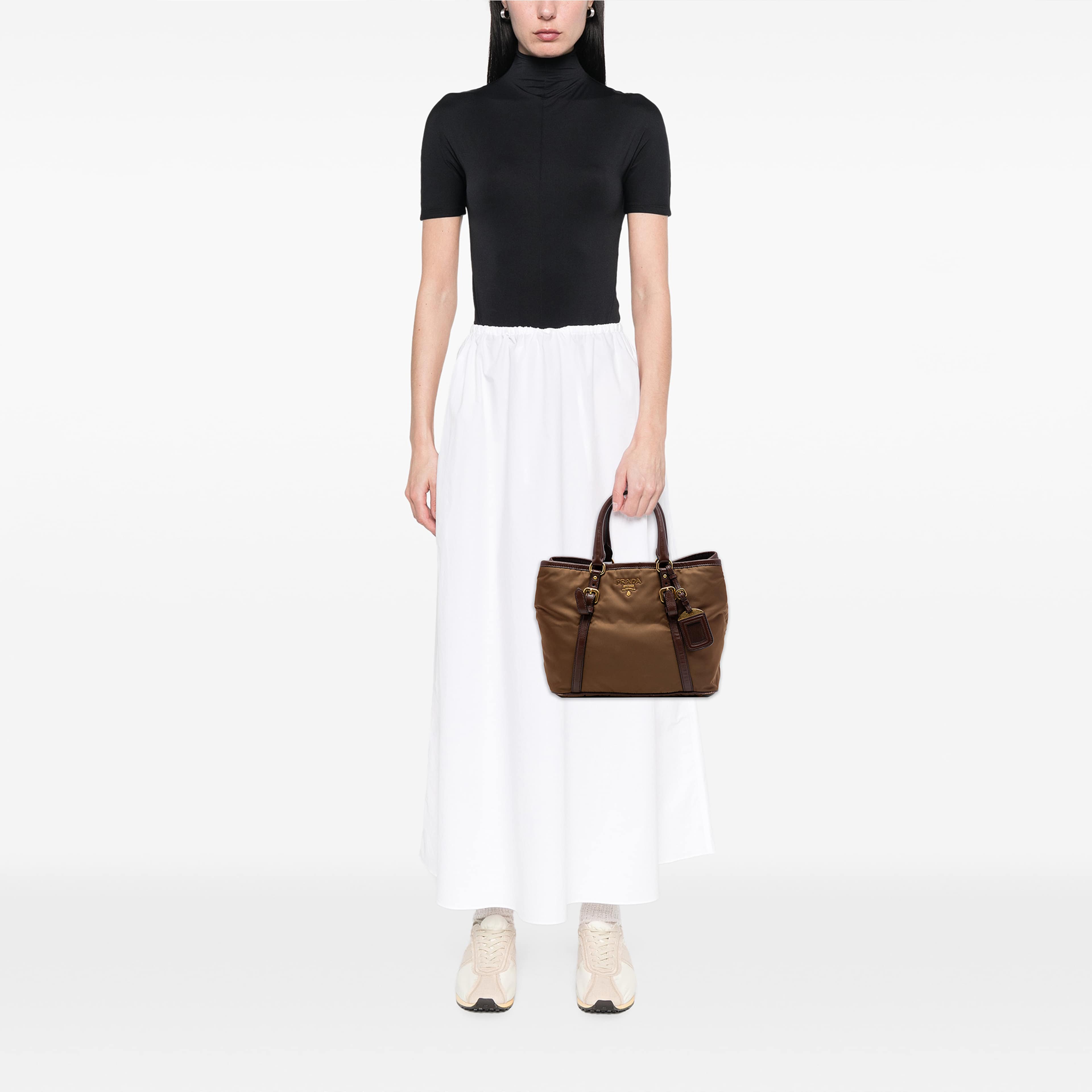 Prada Vitello Daino Trimmed Tessuto Satchel, från Luxclusif, i färgen brun. Klicka för att öppna bilden i stort format