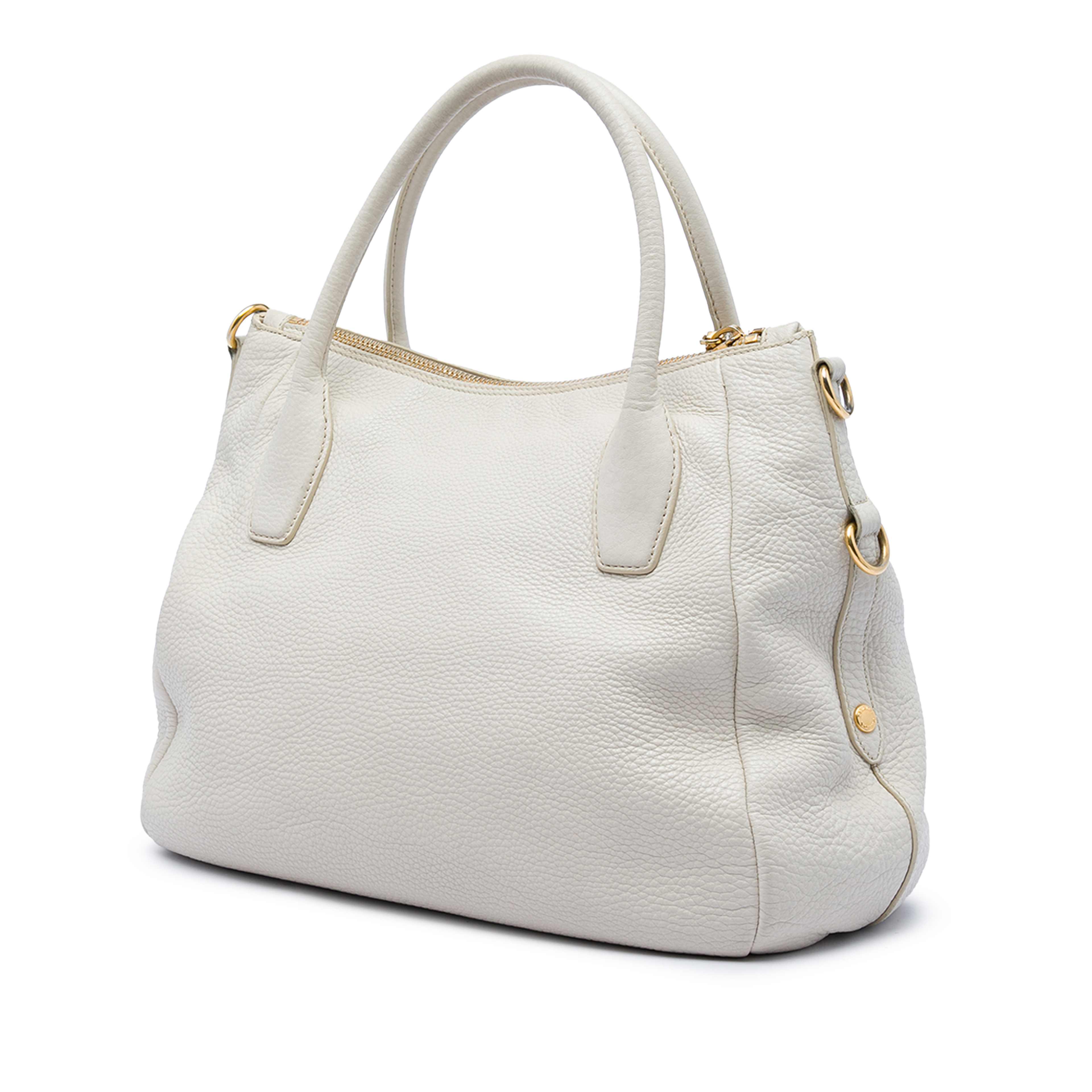 Prada Vitello Daino Zip Top Convertible Tote, från Luxclusif, i färgen grå. Klicka för att öppna bilden i stort format