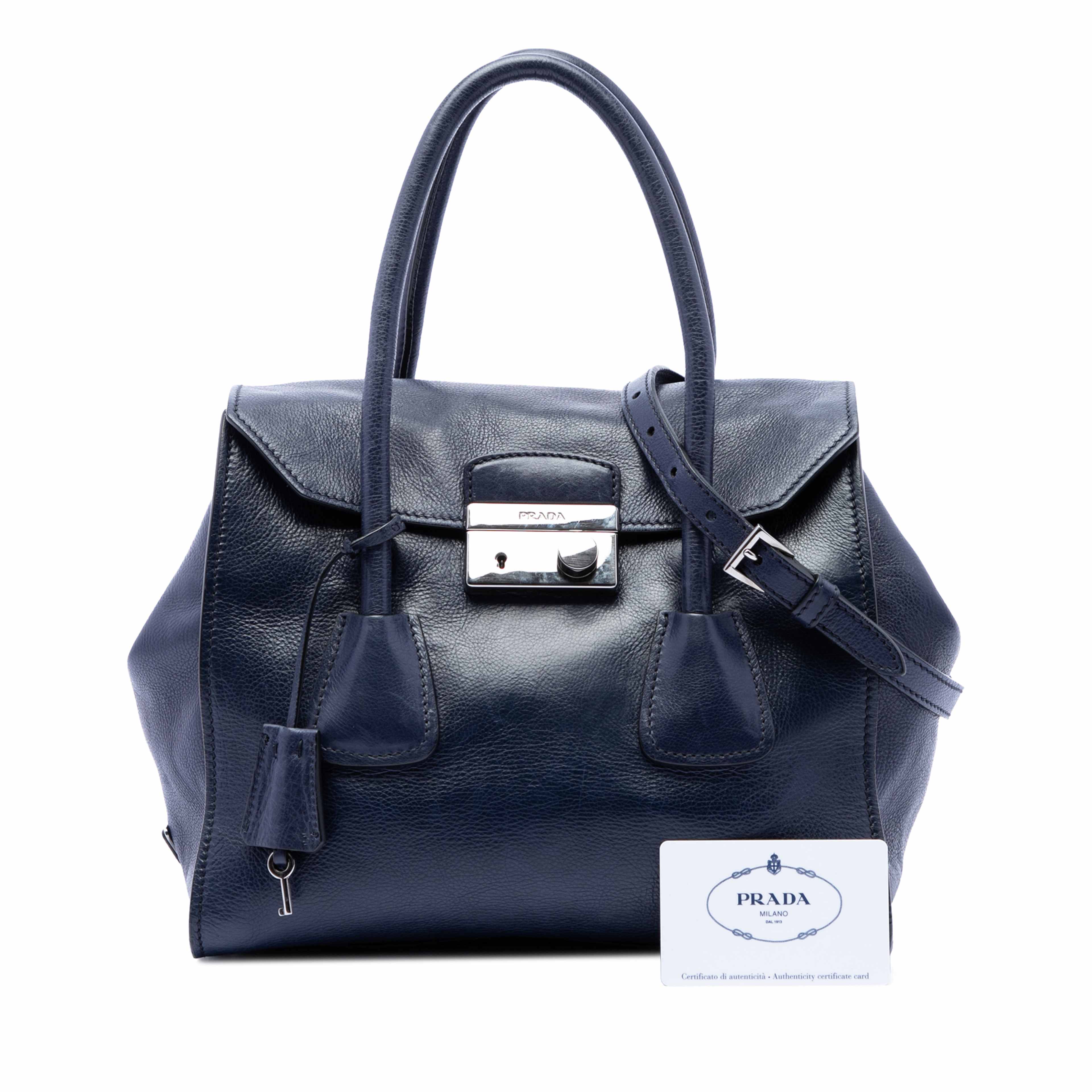 Prada Glace Calf Sound Lock Satchel, från Luxclusif, i färgen blå. Klicka för att öppna bilden i stort format