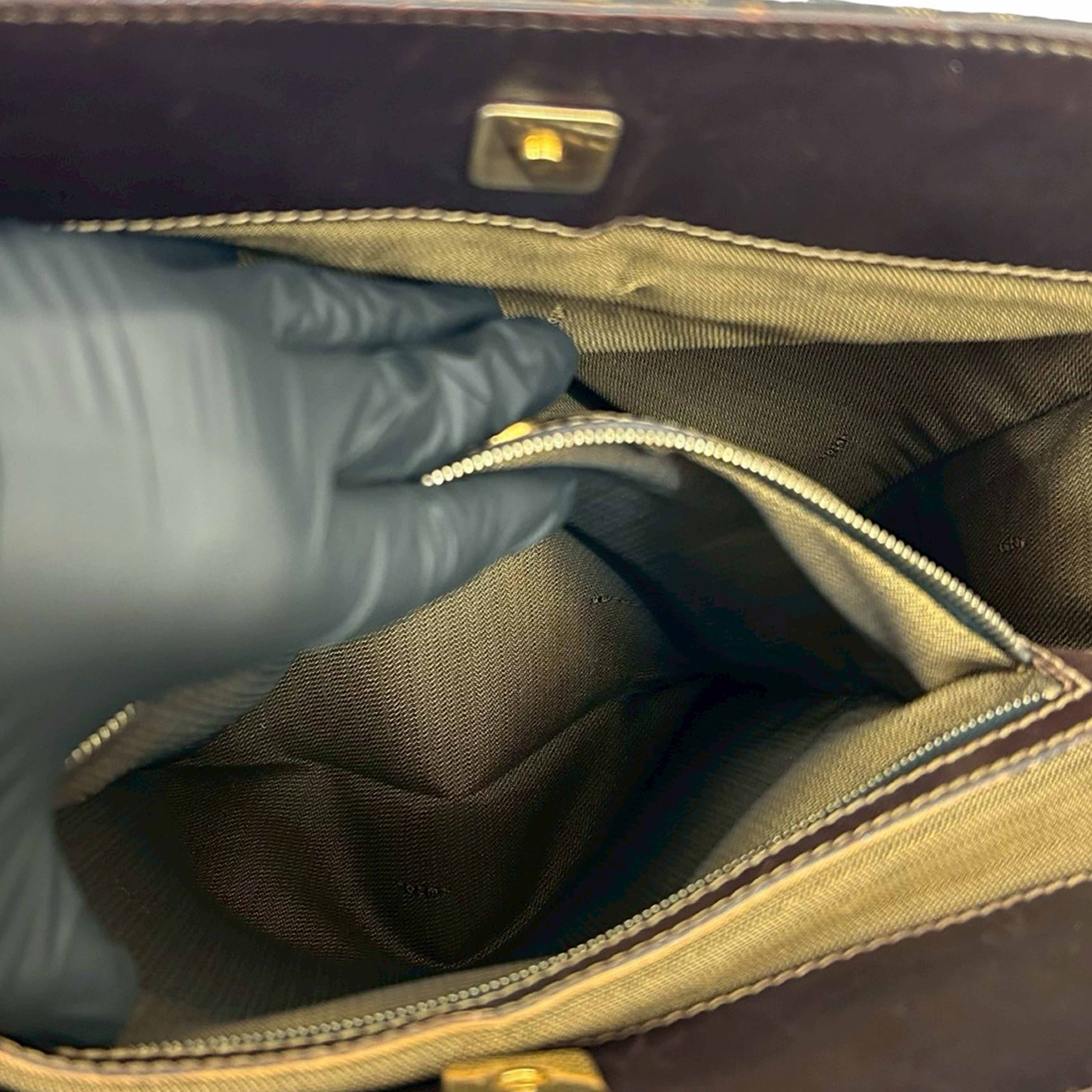 Fendi Zucca Canvas Twins Tote, från Luxclusif, i färgen brown. Klicka för att öppna bilden i stort format