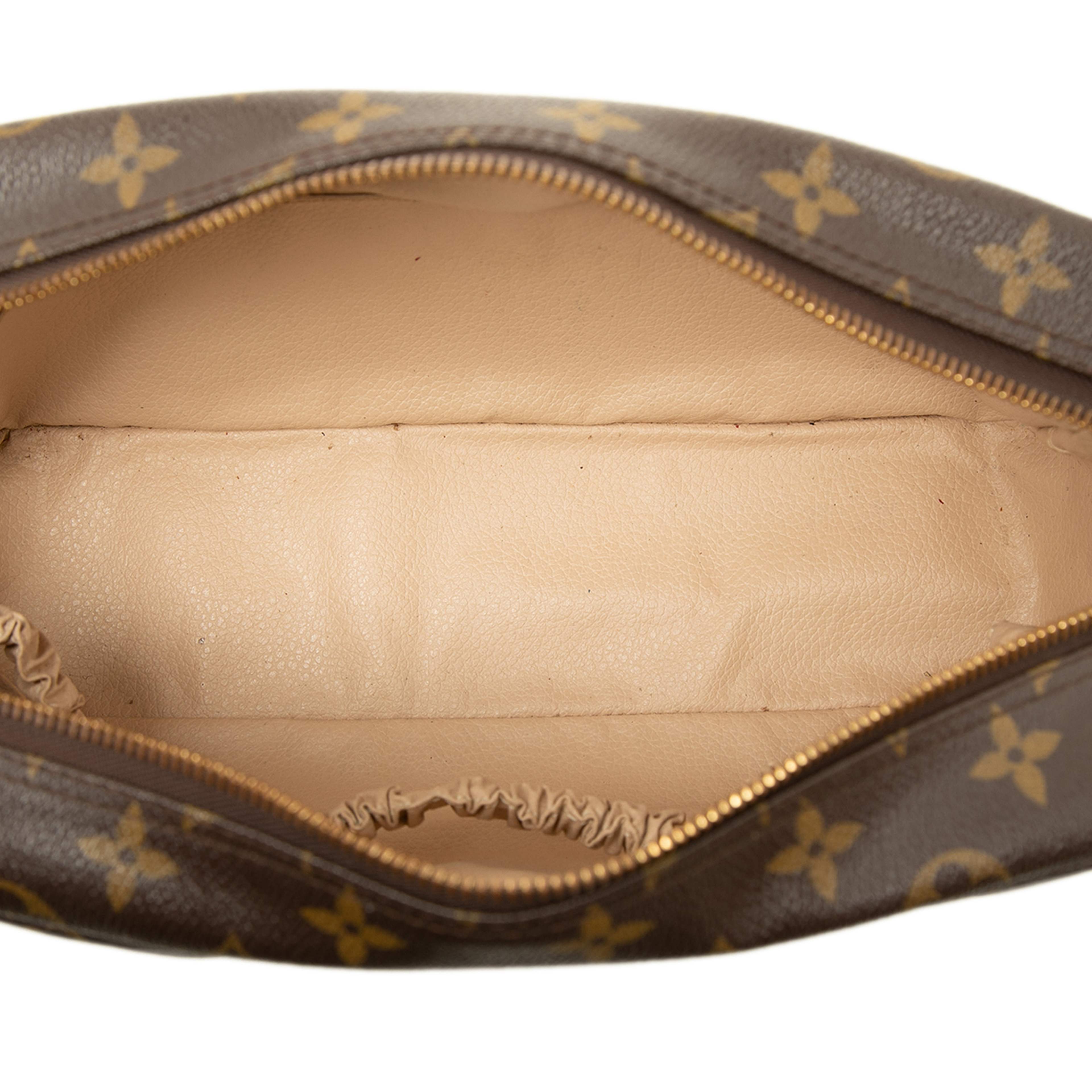 Louis Vuitton Monogram Trousse Toilette 28, från Luxclusif, i färgen brun. Klicka för att öppna bilden i stort format