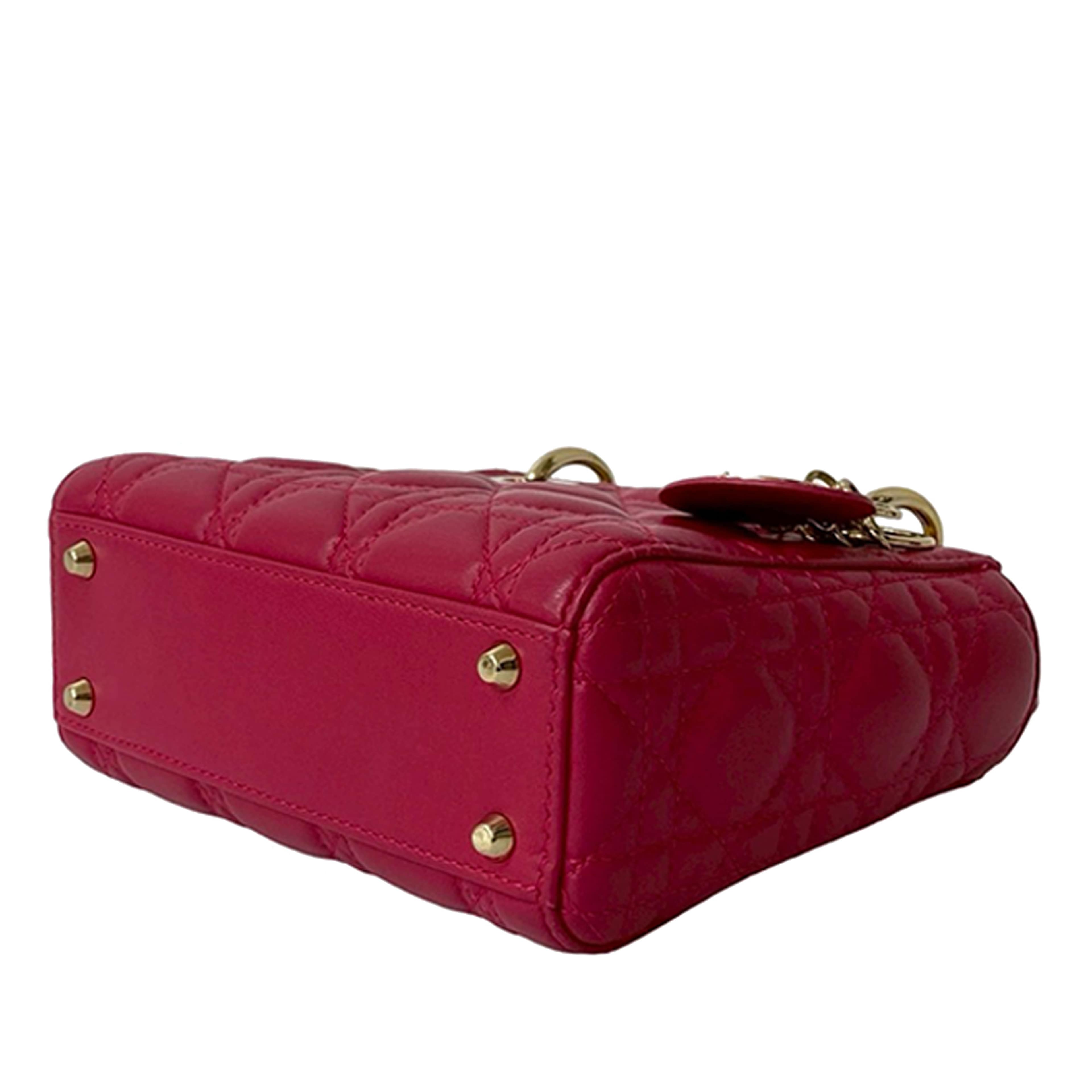 Dior Mini Lambskin Cannage Lady Dior, från Luxclusif, i färgen dark pink. Klicka för att öppna bilden i stort format