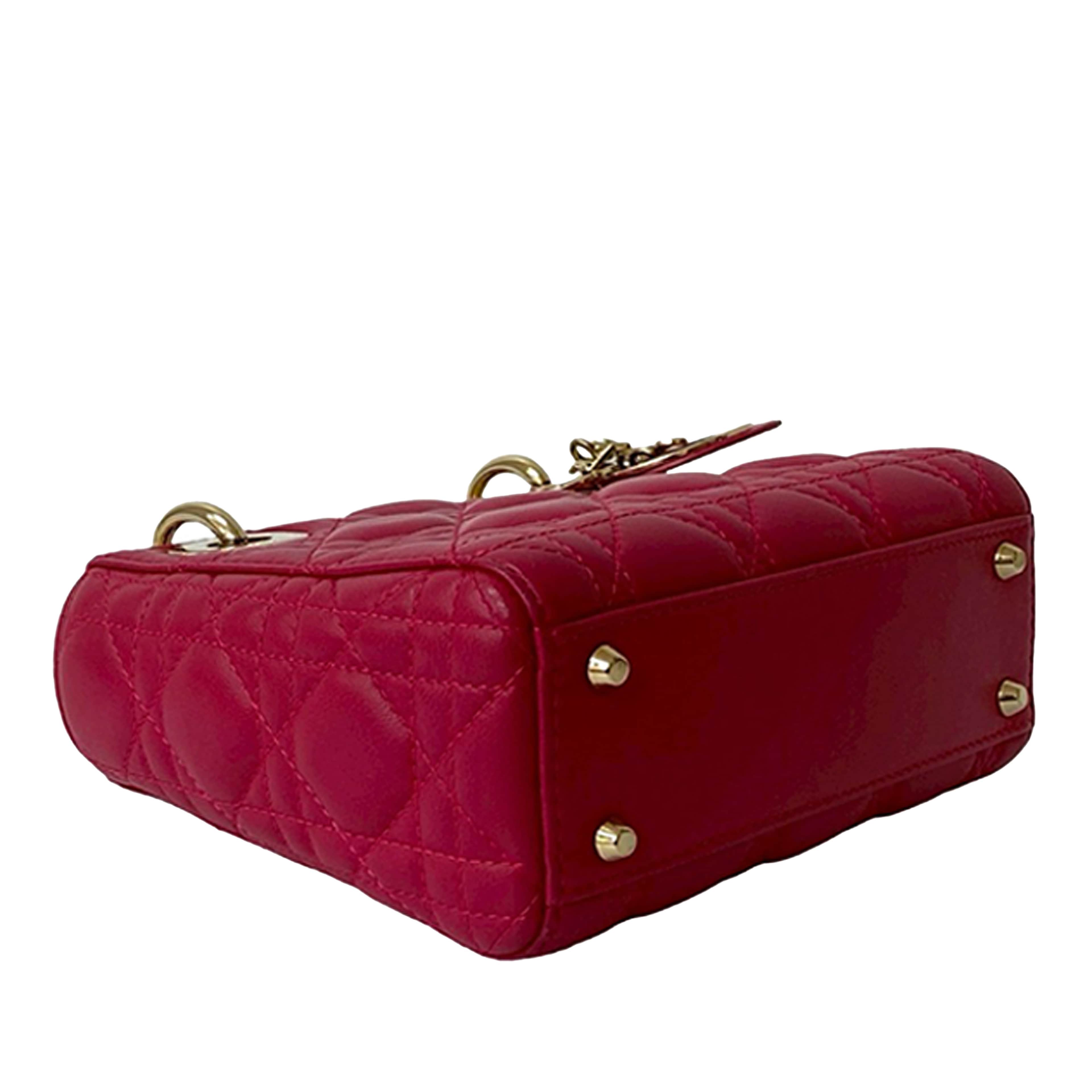 Dior Mini Lambskin Cannage Lady Dior, från Luxclusif, i färgen dark pink. Klicka för att öppna bilden i stort format