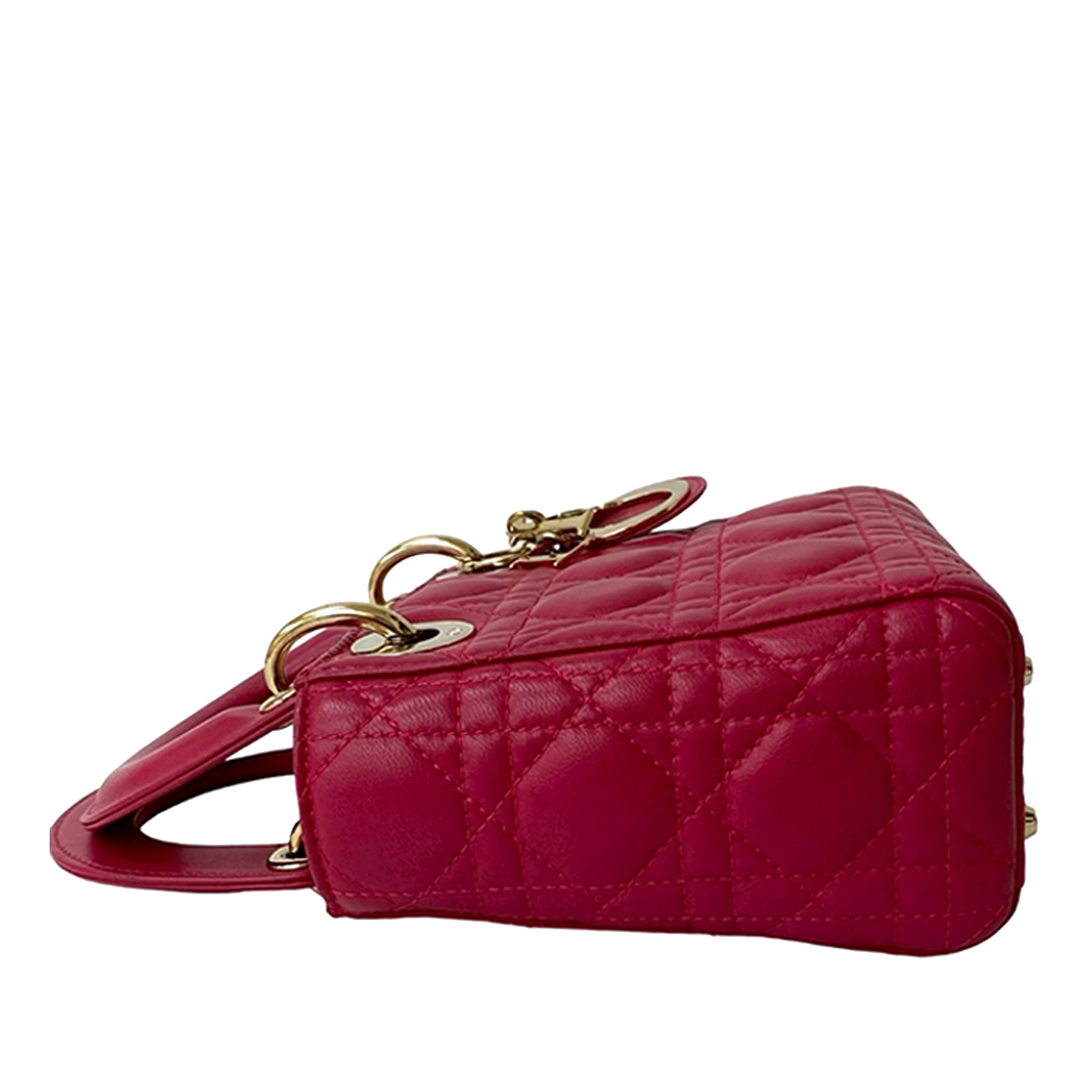 Dior Mini Lambskin Cannage Lady Dior, från Luxclusif, i färgen dark pink. Klicka för att öppna bilden i stort format