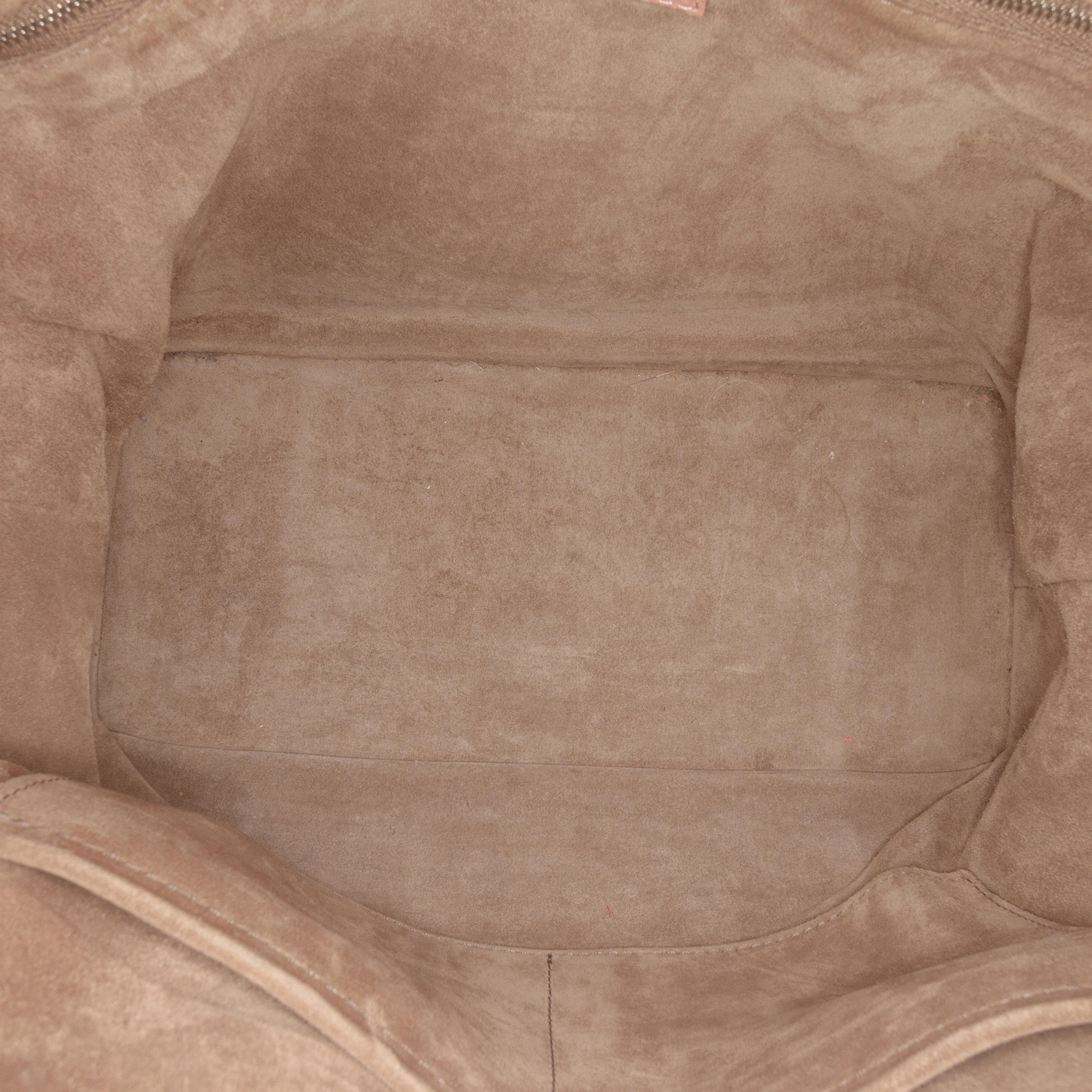 Louis Vuitton Taurillon Soft Lockit Mm, från Luxclusif, i färgen pink. Klicka för att öppna bilden i stort format