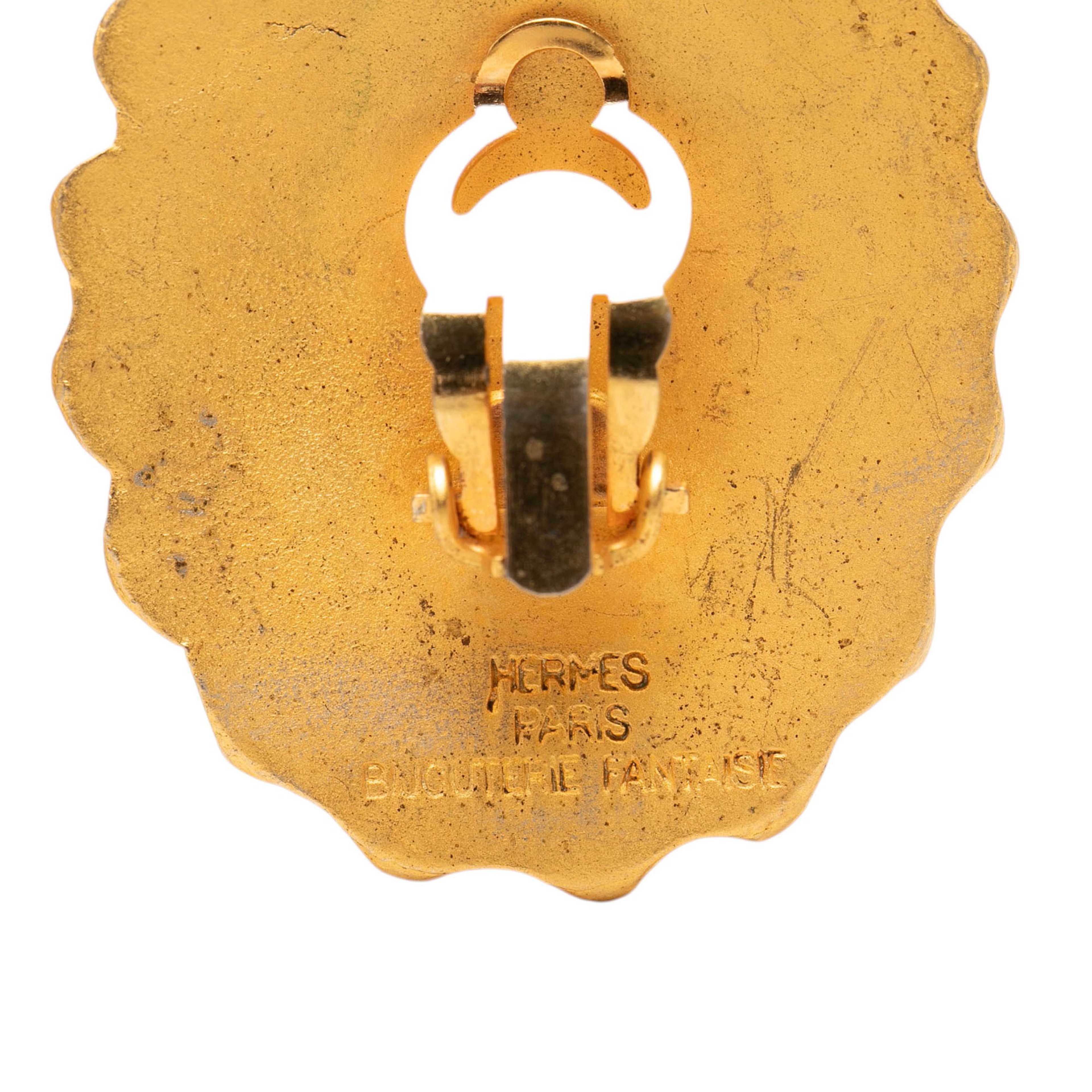 Hermès Gold Plated Sun Clip On Earrings, från Luxclusif, i färgen guld. Klicka för att öppna bilden i stort format