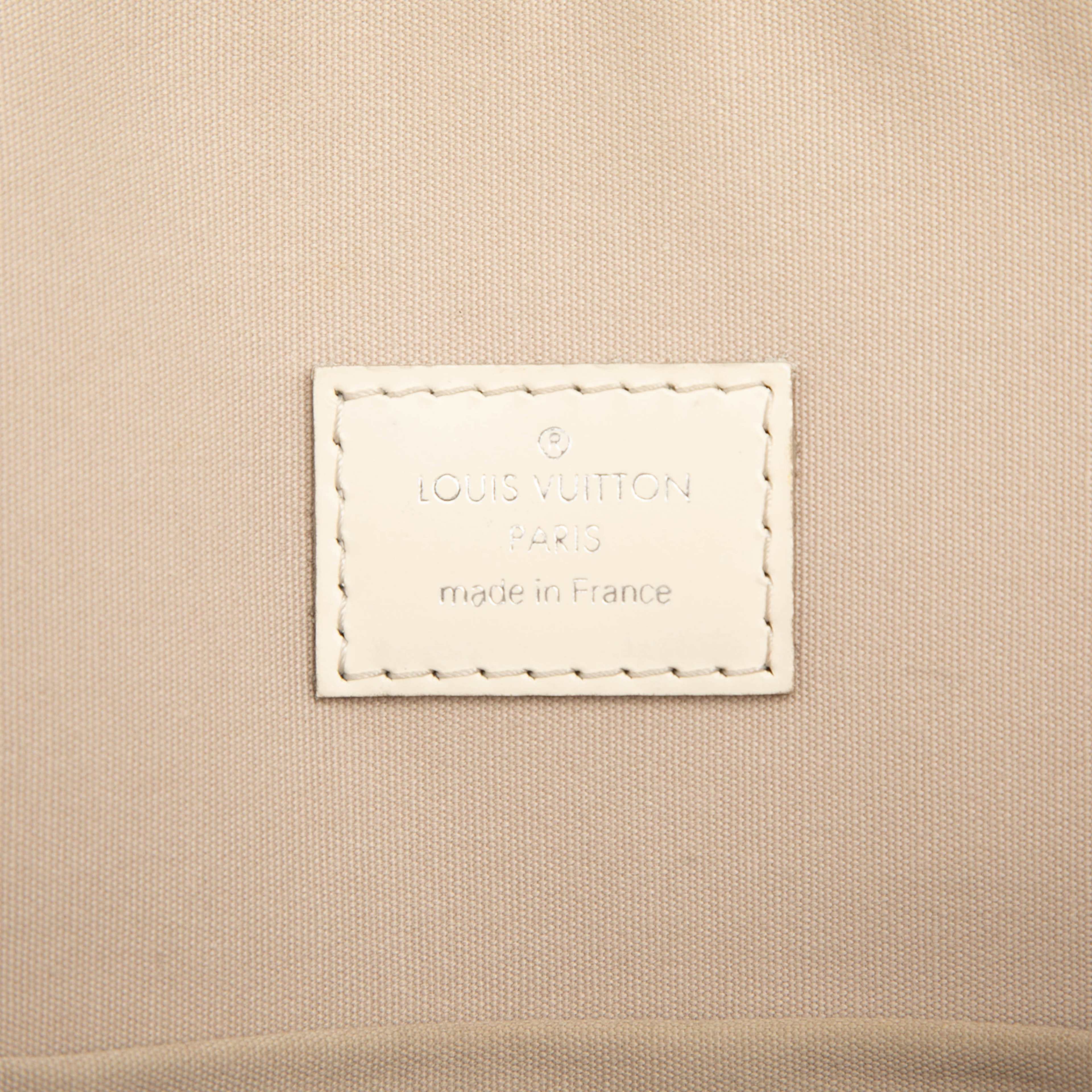 Louis Vuitton Epi Lockit Vertical, från Luxclusif, i färgen white. Klicka för att öppna bilden i stort format