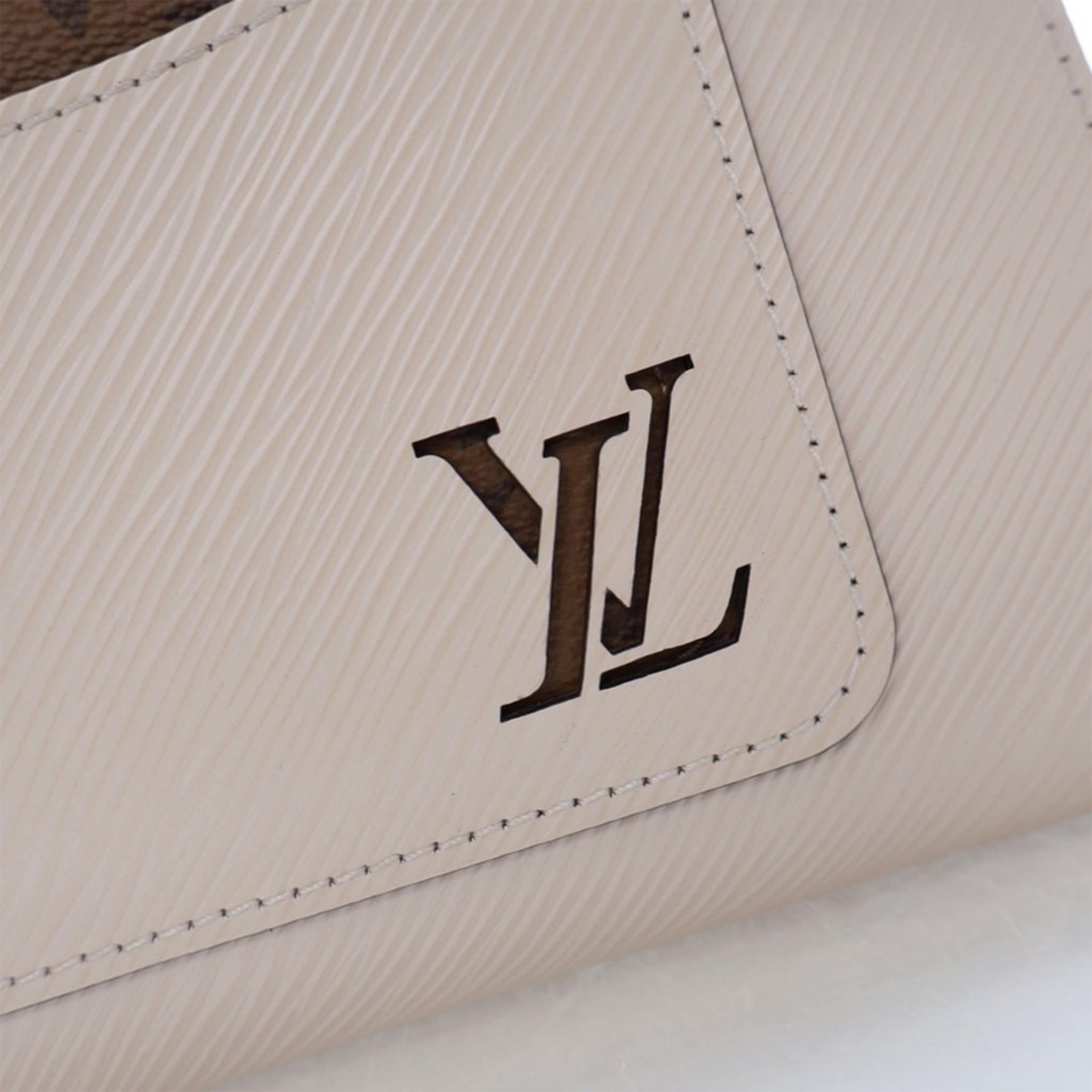 Louis Vuitton Epi Marelle Bb, från Luxclusif, i färgen white. Klicka för att öppna bilden i stort format