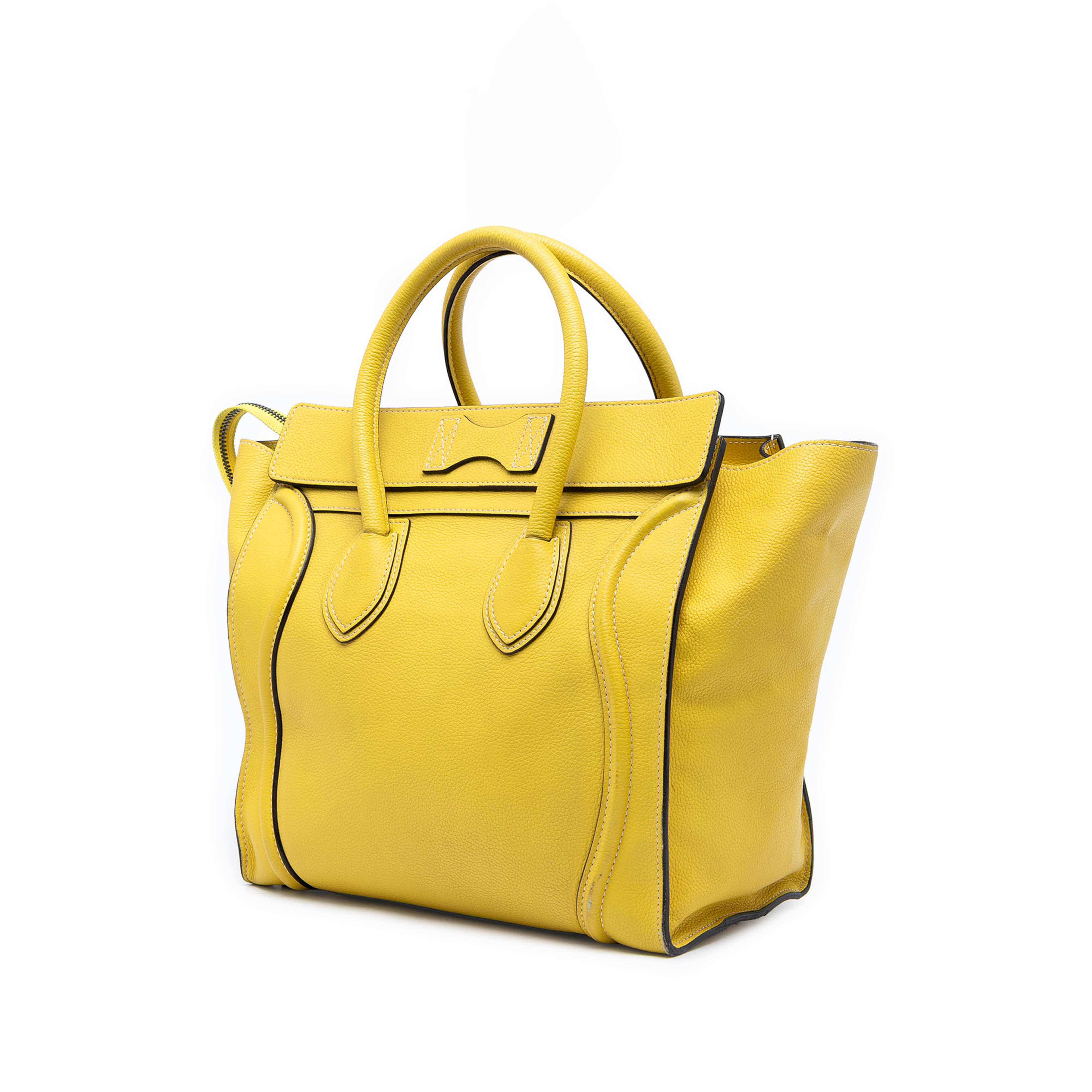 Celine Mini Calfskin Luggage Tote, från Luxclusif, i färgen gul. Klicka för att öppna bilden i stort format