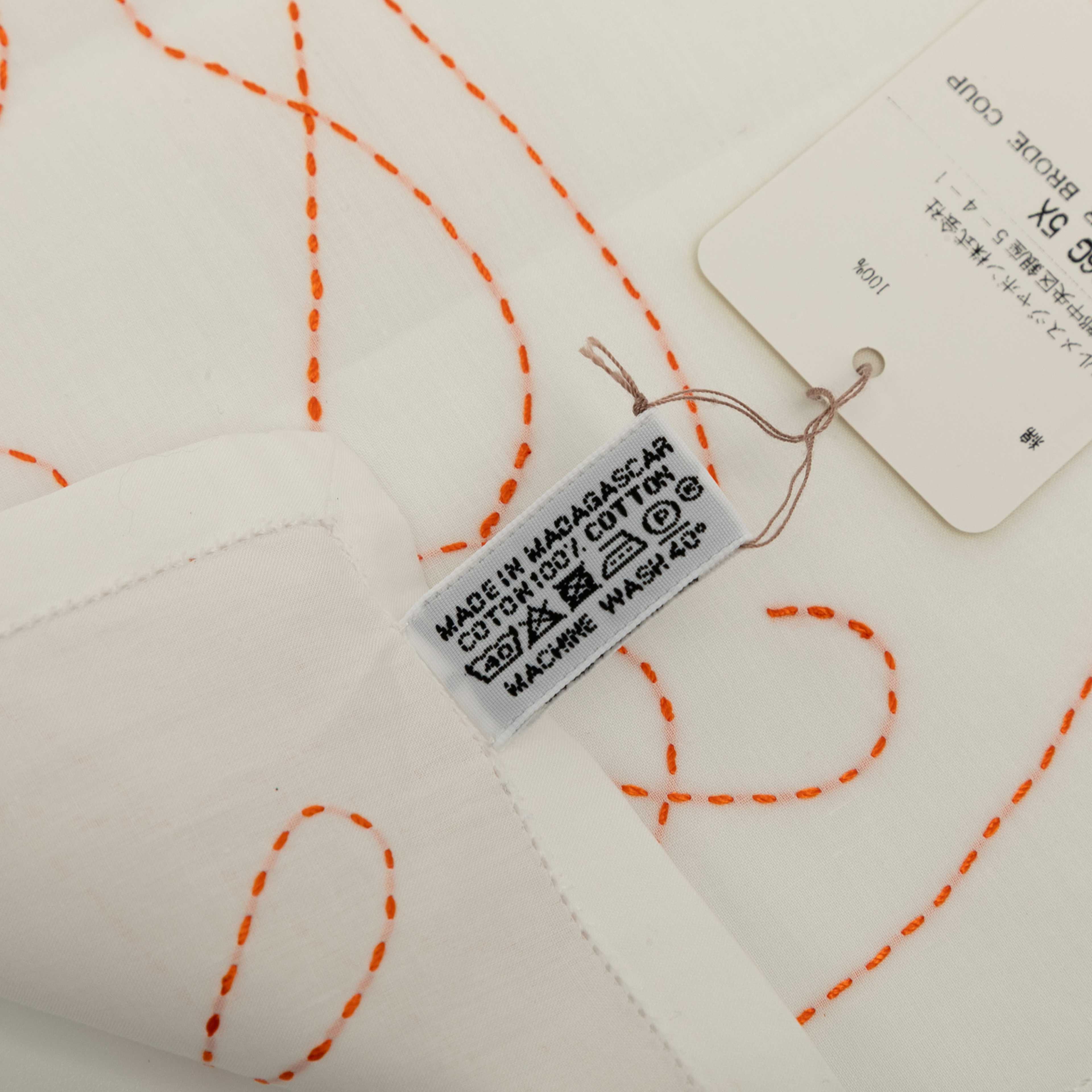 Hermès Embroidered Coup De Fouet Cotton Handkerchief, från Luxclusif, i färgen white. Klicka för att öppna bilden i stort format