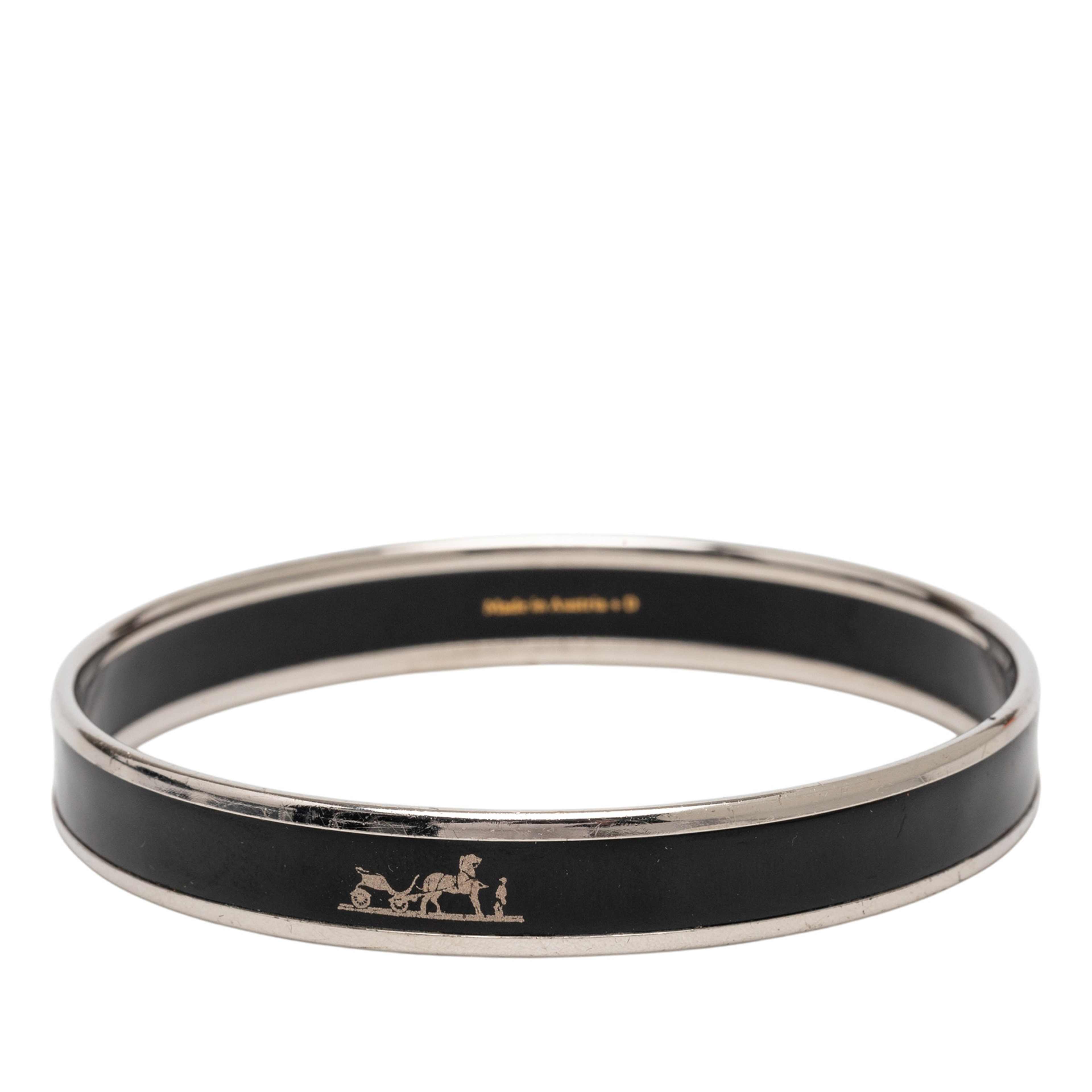 Hermès Narrow Enamel Calech Bangle Bracelet 65, från Luxclusif, i färgen black. Klicka för att öppna bilden i stort format