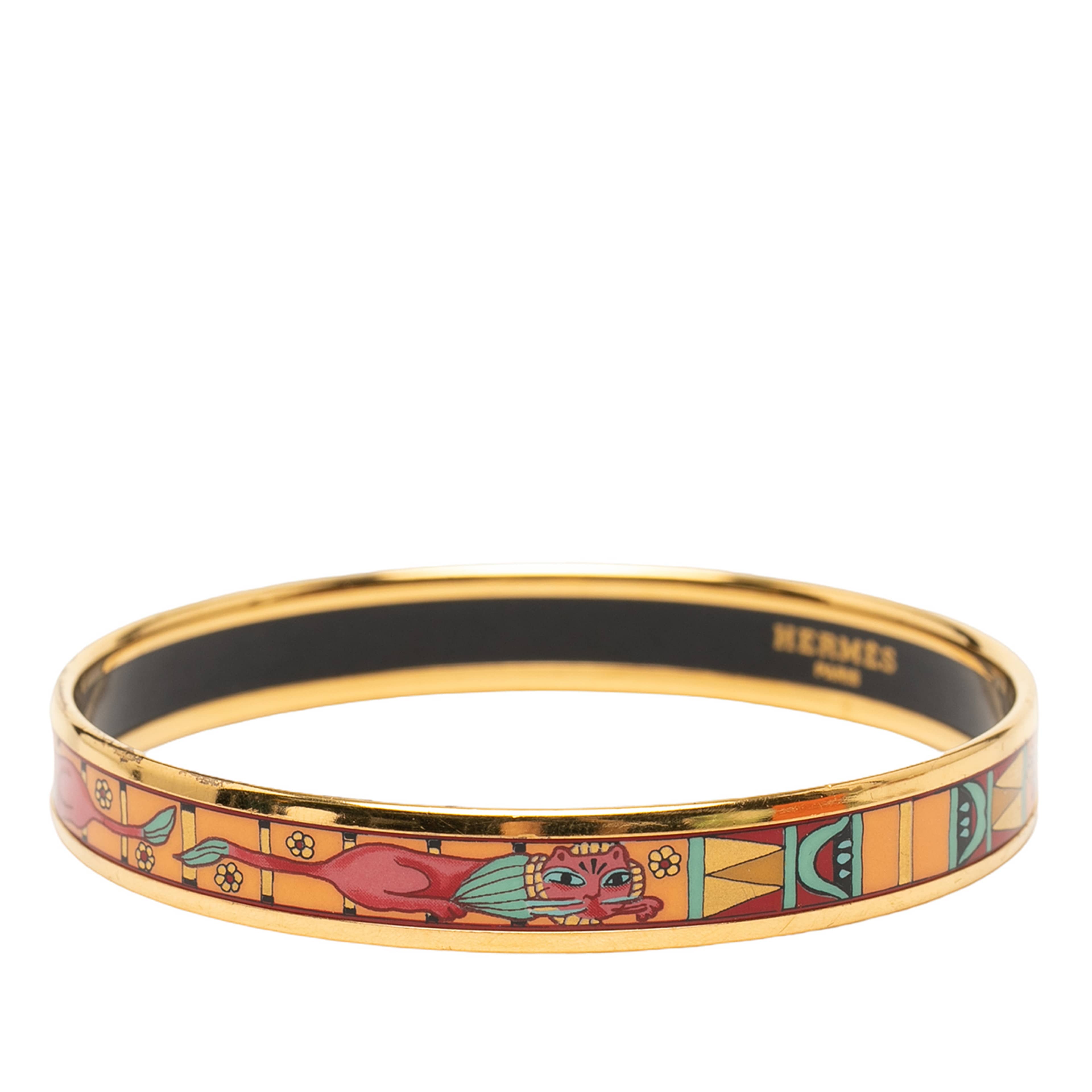 Hermès Narrow Animal Motif Enamel Bangle 62, från Luxclusif, i färgen gold. Klicka för att öppna bilden i stort format