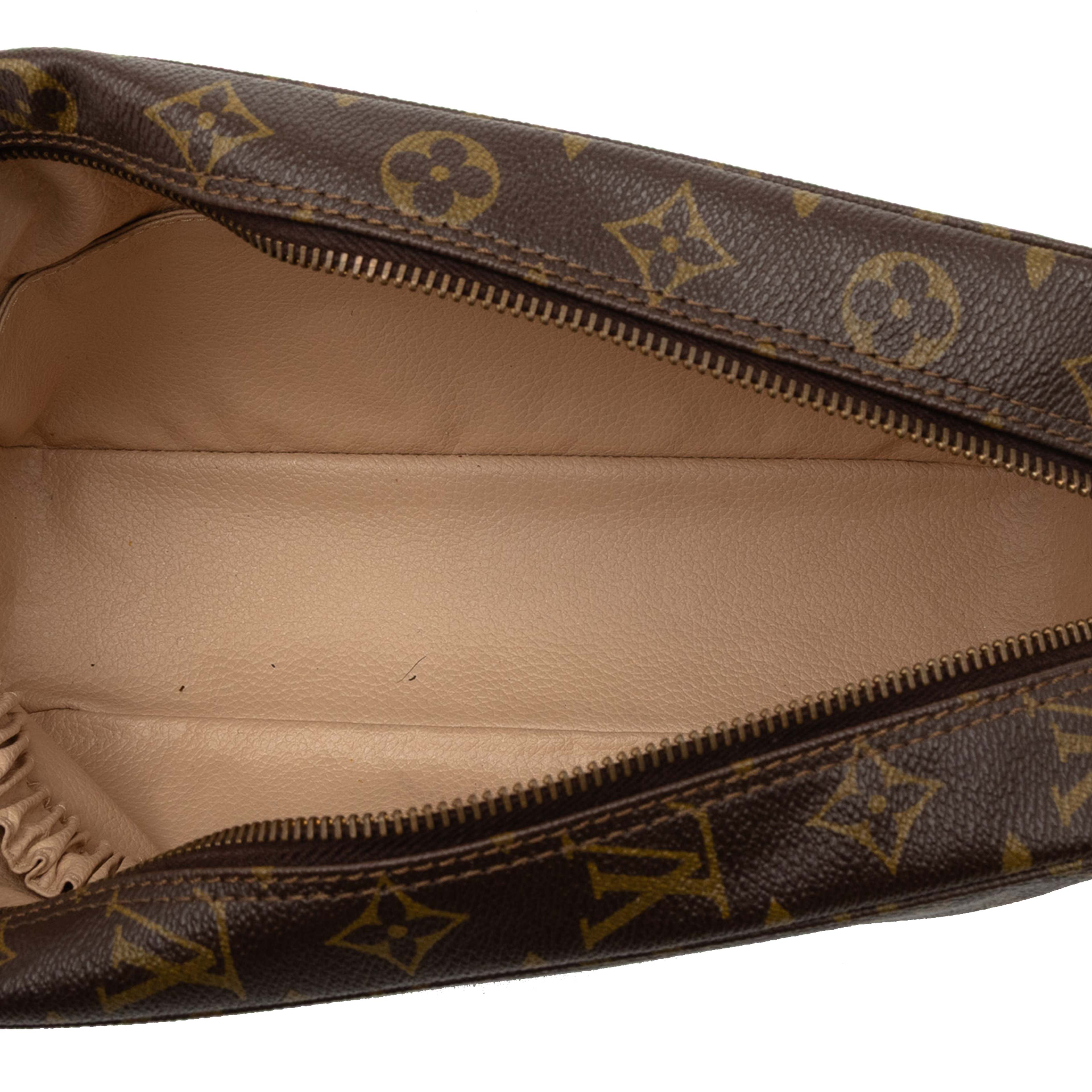 Louis Vuitton Monogram Trousse Toilette 28, från Luxclusif, i färgen brown. Klicka för att öppna bilden i stort format