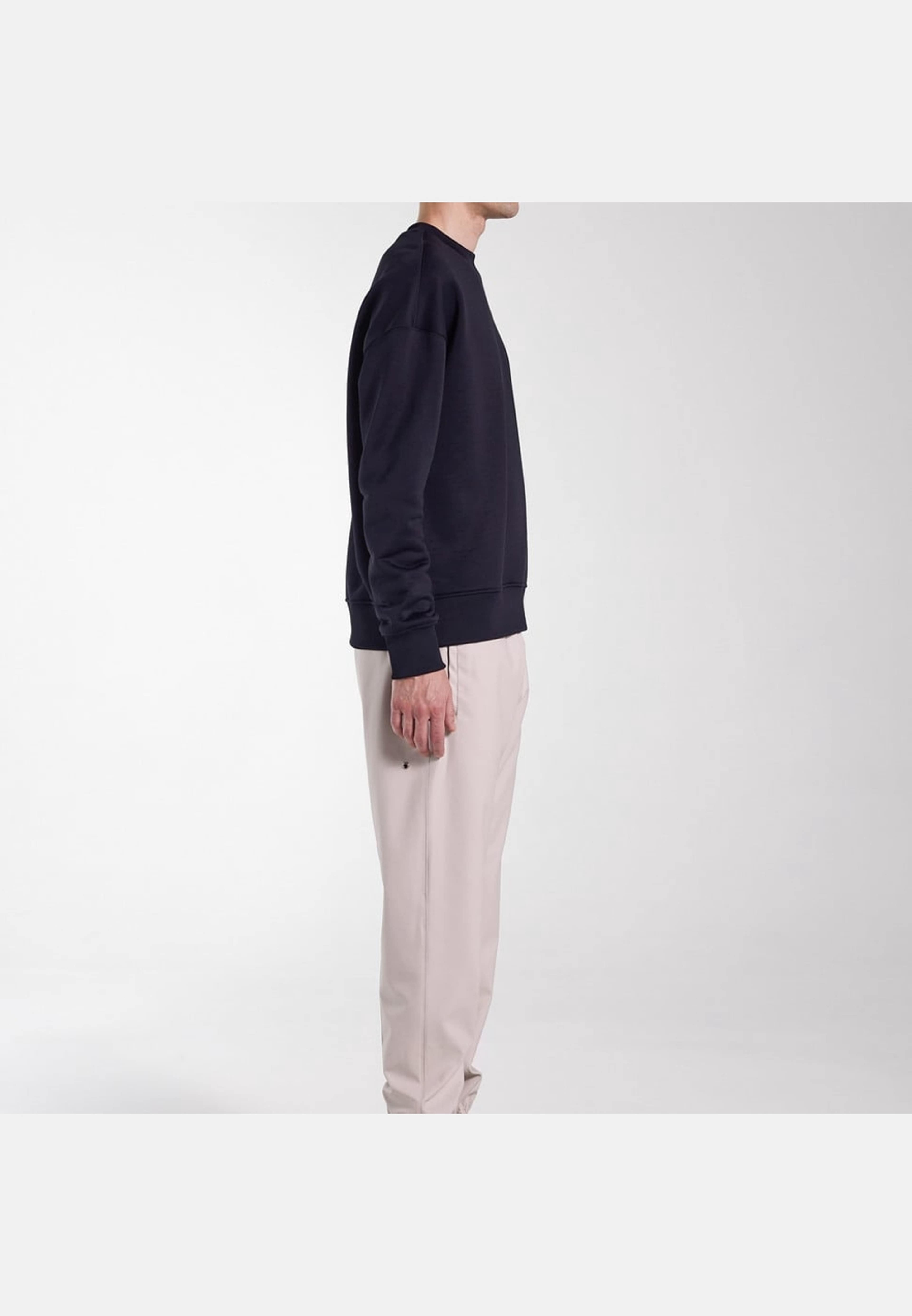 Vanadis Trousers, från Stutterheim, i färgen light sand. Klicka för att öppna bilden i stort format