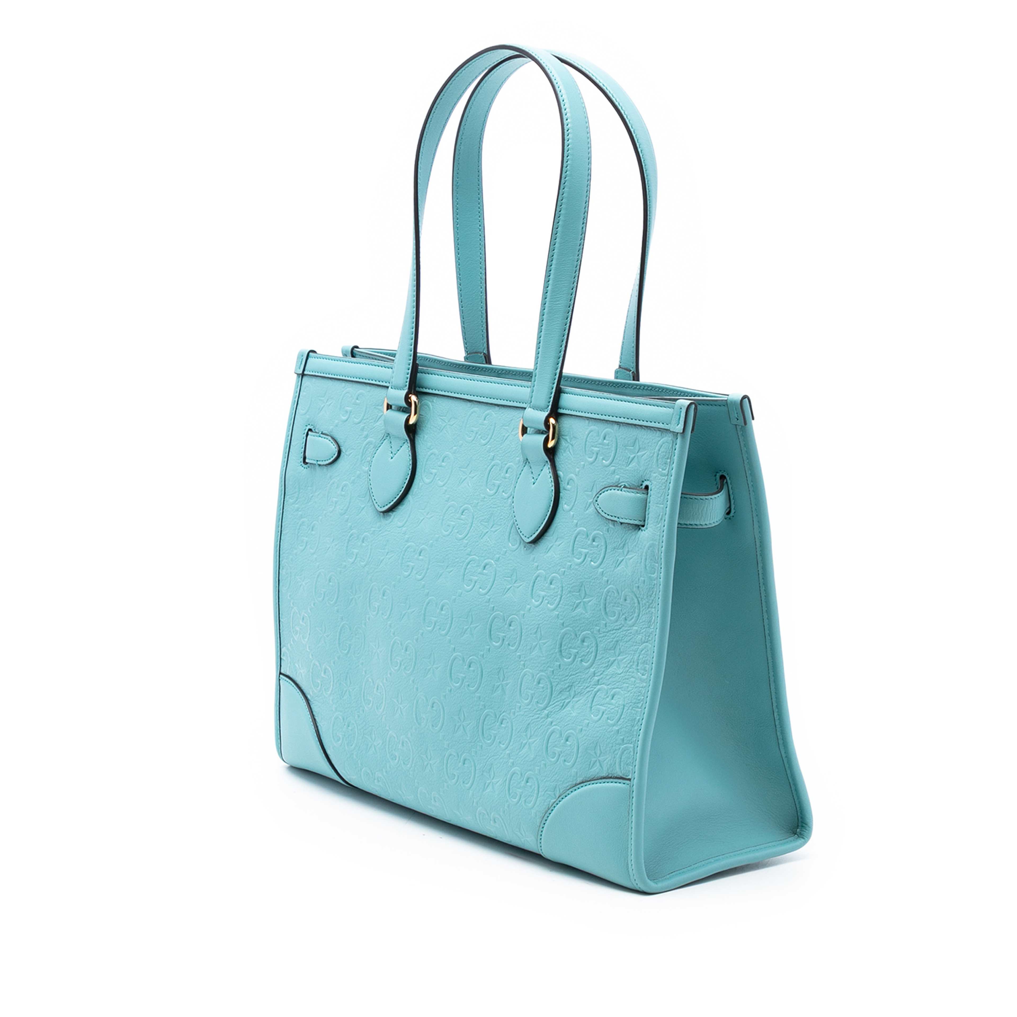Gucci Gg Star Embossed Leather Tote, från Luxclusif, i färgen turquoise. Klicka för att öppna bilden i stort format