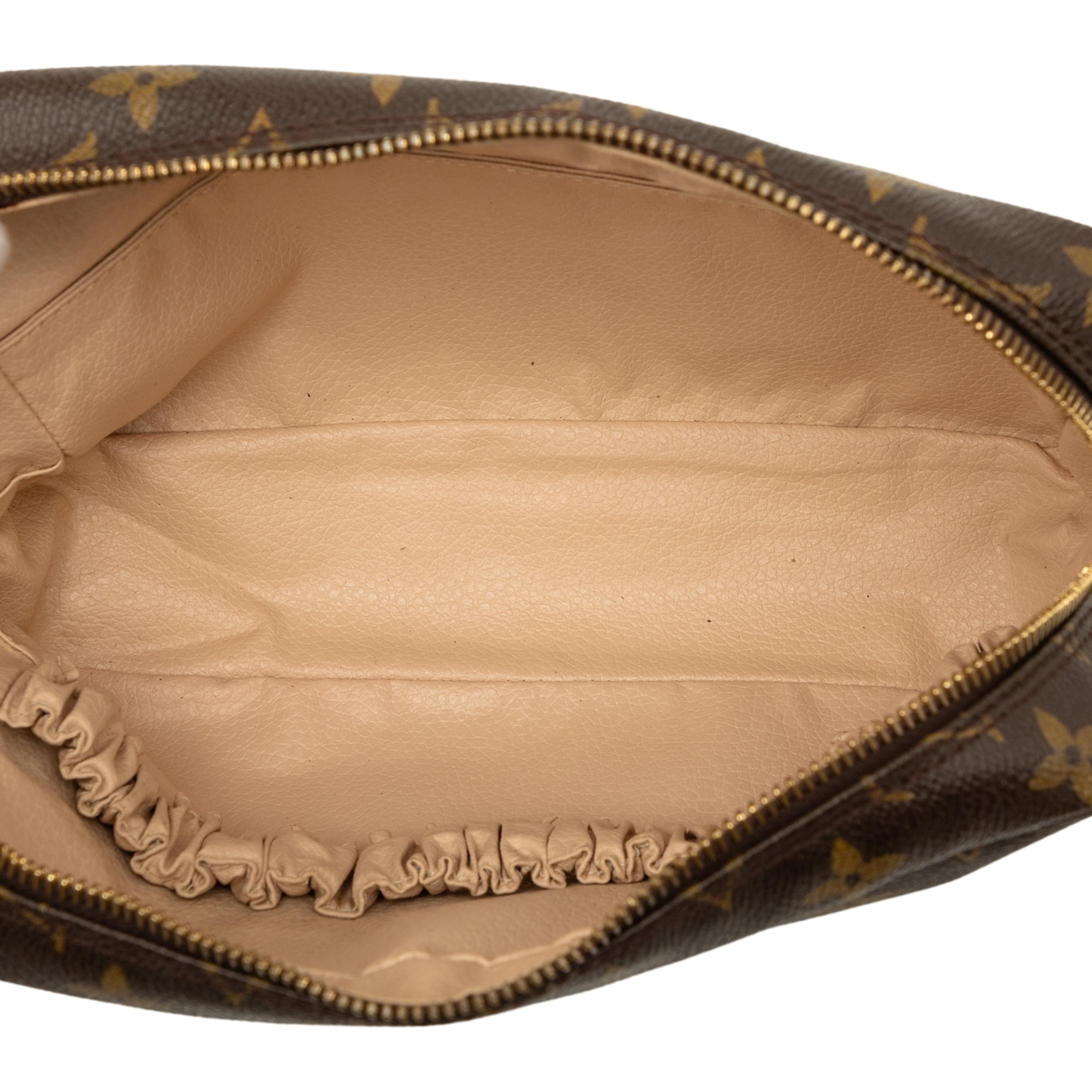 Louis Vuitton Monogram Trousse Toilette 23, från Luxclusif, i färgen brun. Klicka för att öppna bilden i stort format