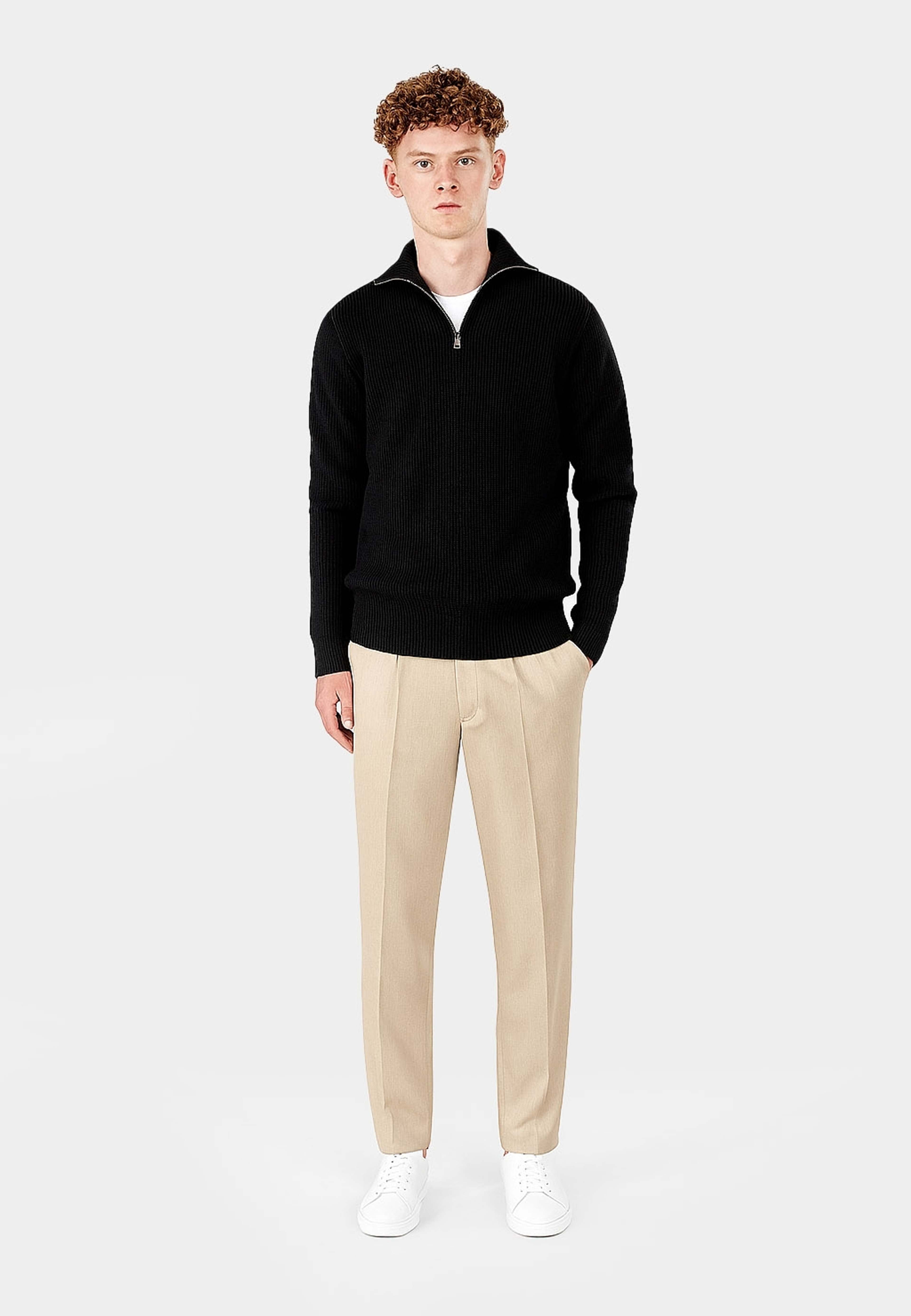 Reuben Knitted Half Zip, från Ciszere, i färgen black. Klicka för att öppna bilden i stort format