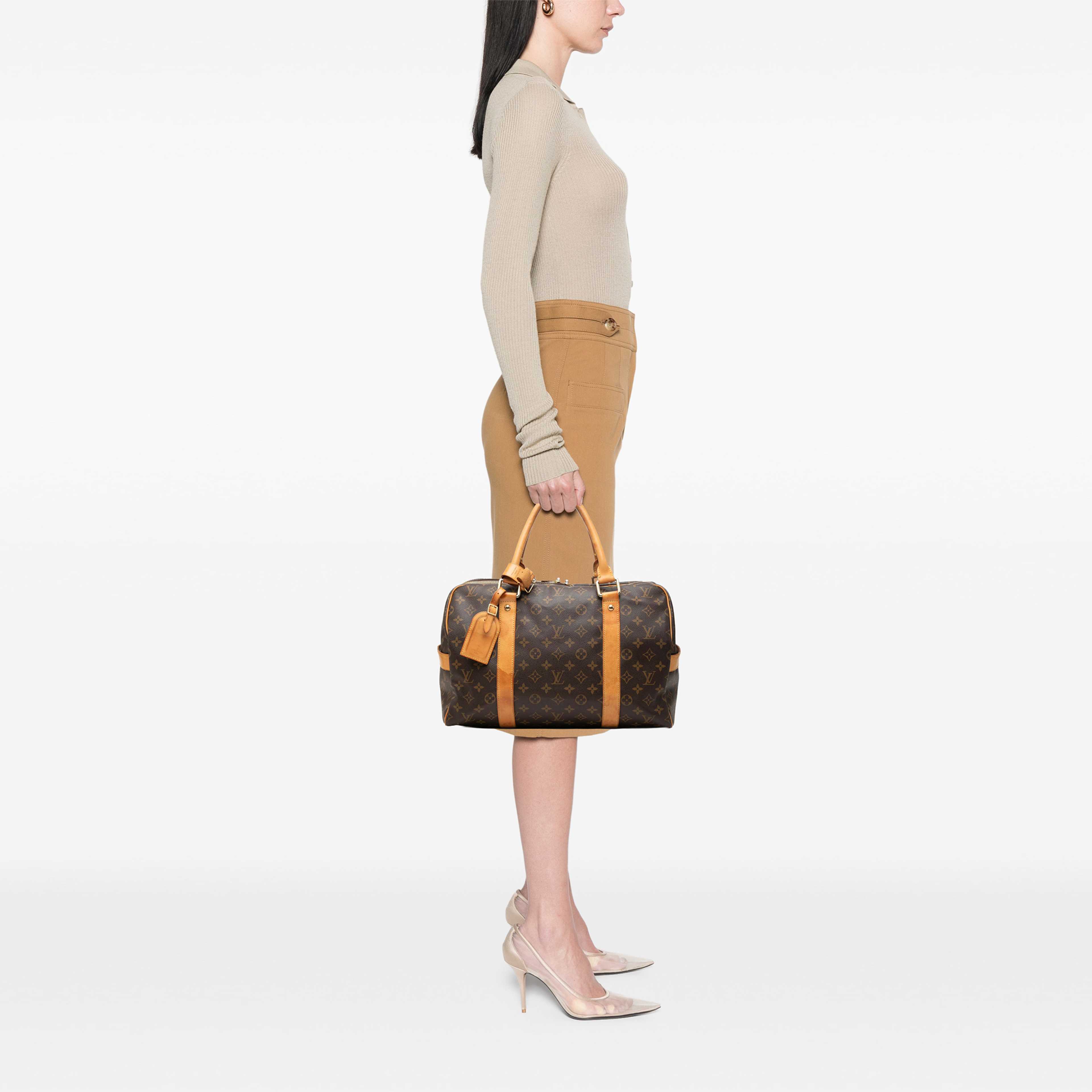 Louis Vuitton Monogram Carryall, från Luxclusif, i färgen brun. Klicka för att öppna bilden i stort format