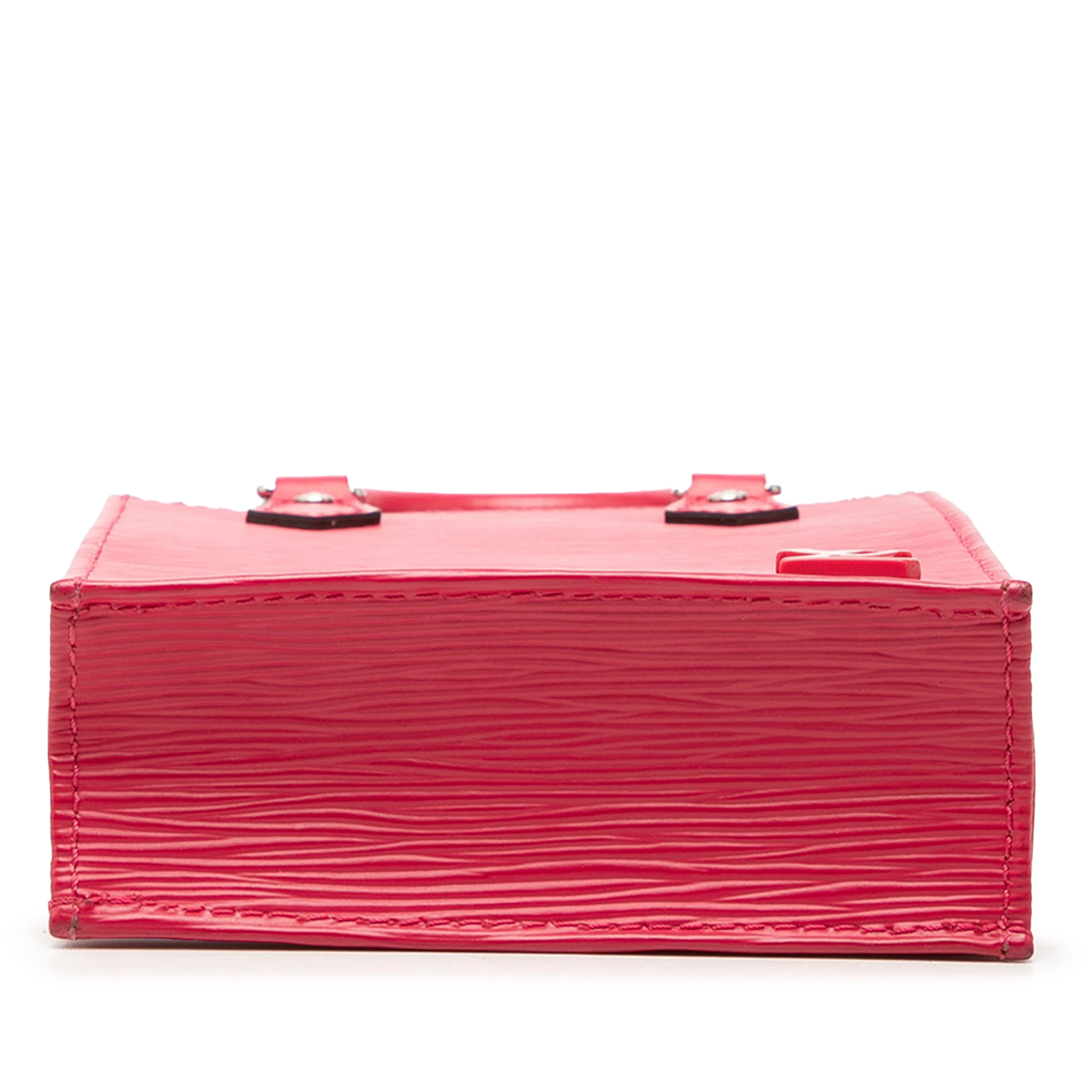 Louis Vuitton Epi Petit Sac Plat, från Luxclusif, i färgen hot pink. Klicka för att öppna bilden i stort format