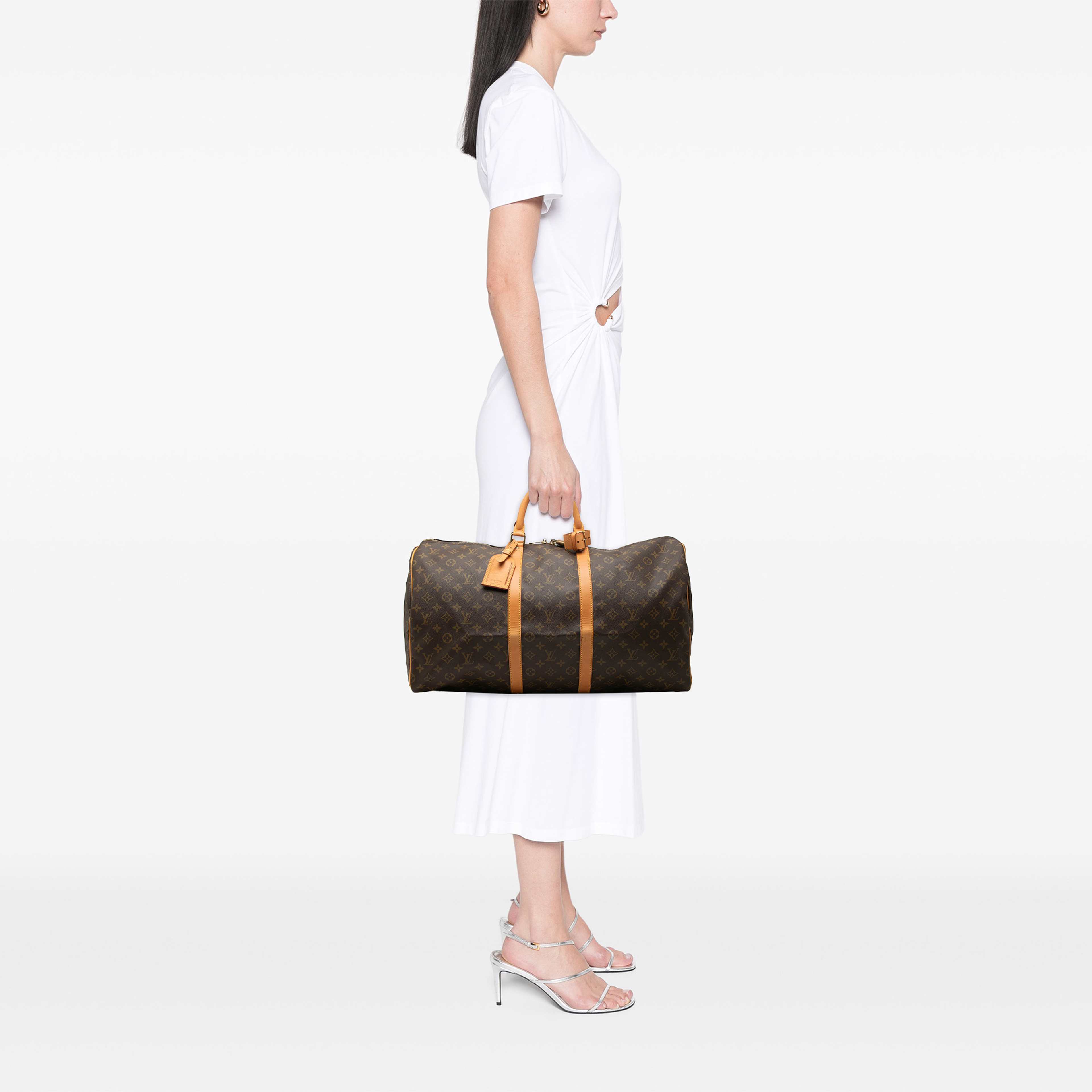 Louis Vuitton Monogram Keepall 55, från Luxclusif, i färgen brun. Klicka för att öppna bilden i stort format