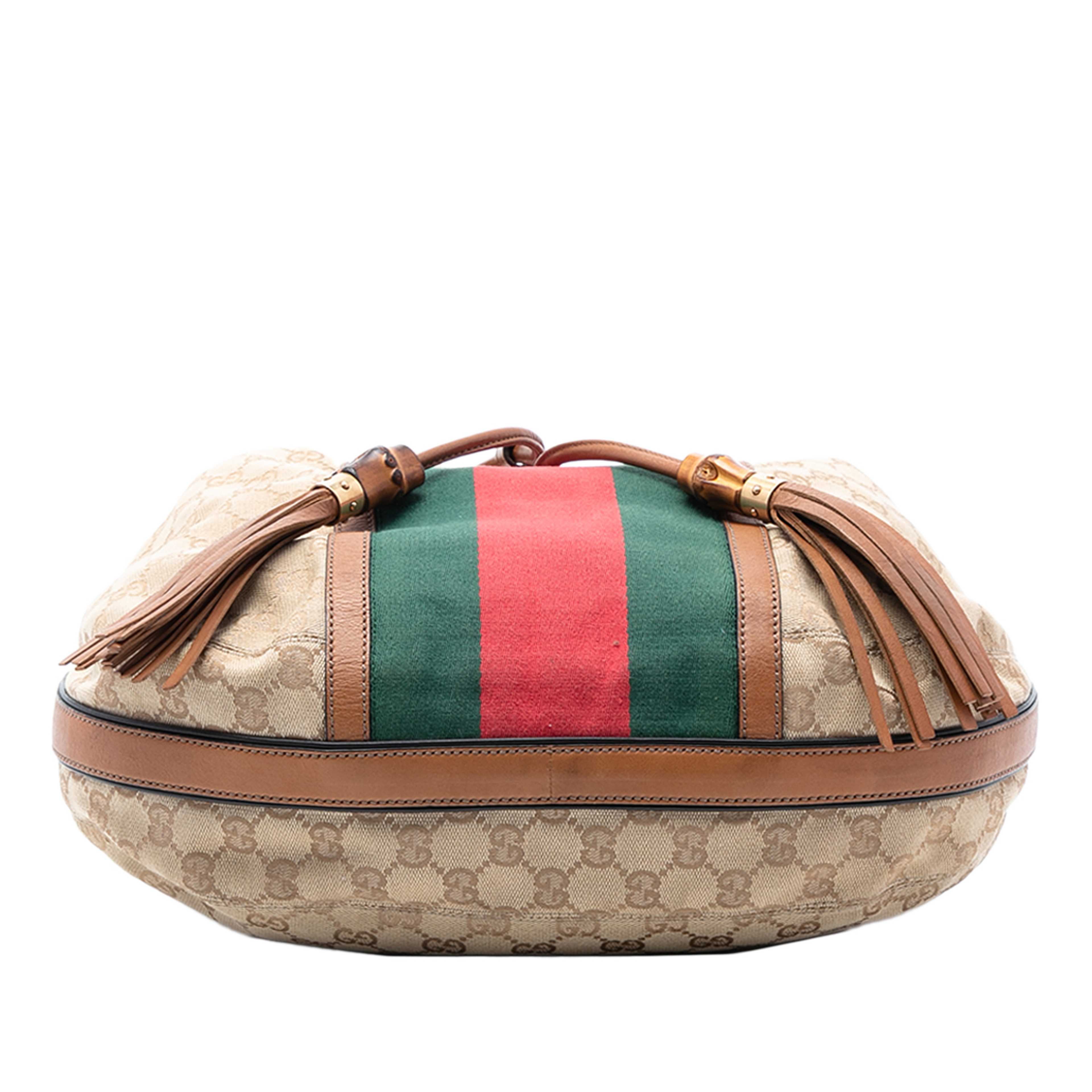 Gucci Gg Canvas Web Rania Drawstring Hobo, från Luxclusif, i färgen beige. Klicka för att öppna bilden i stort format