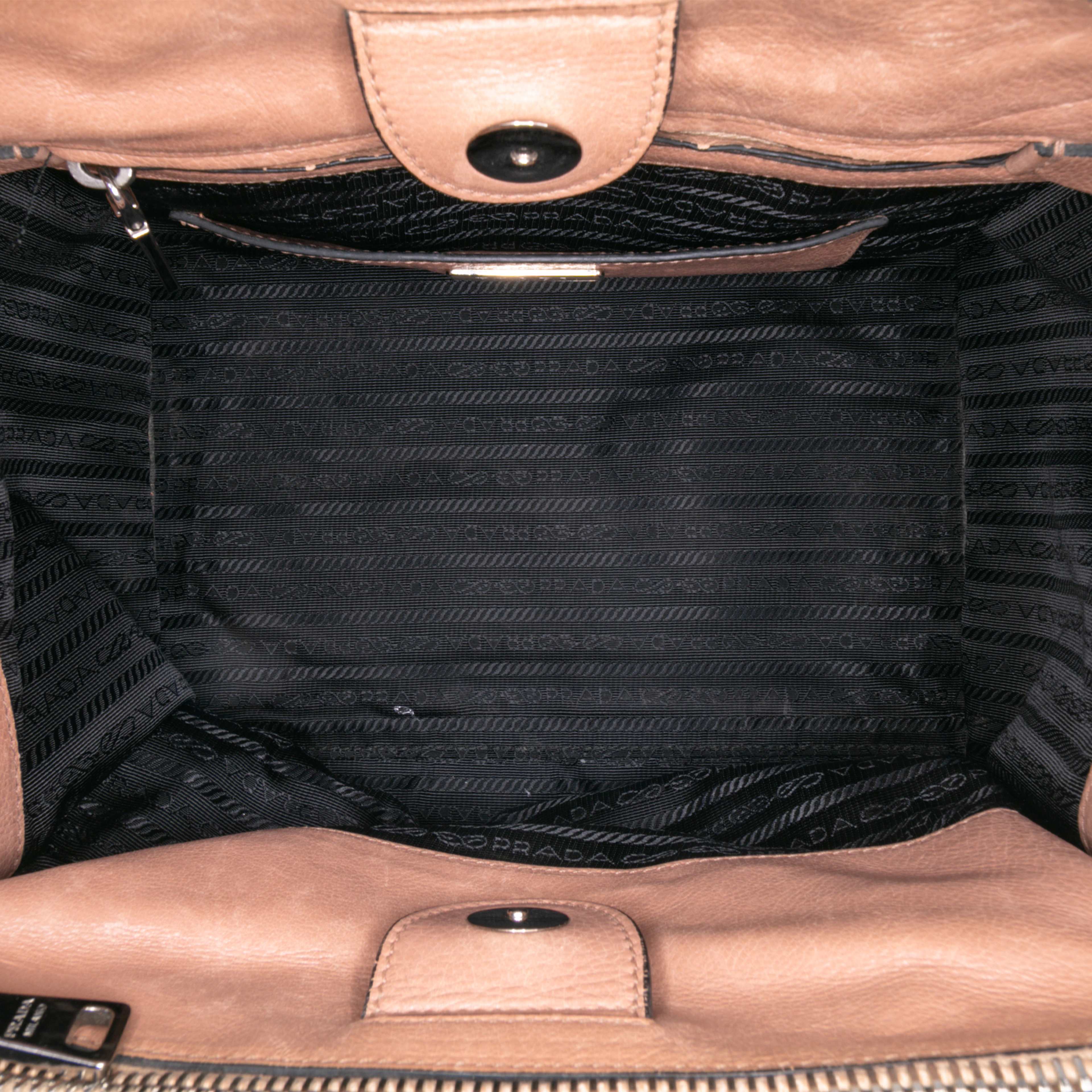Prada Glace Calf Twin Pocket Satchel, från Luxclusif, i färgen brown.