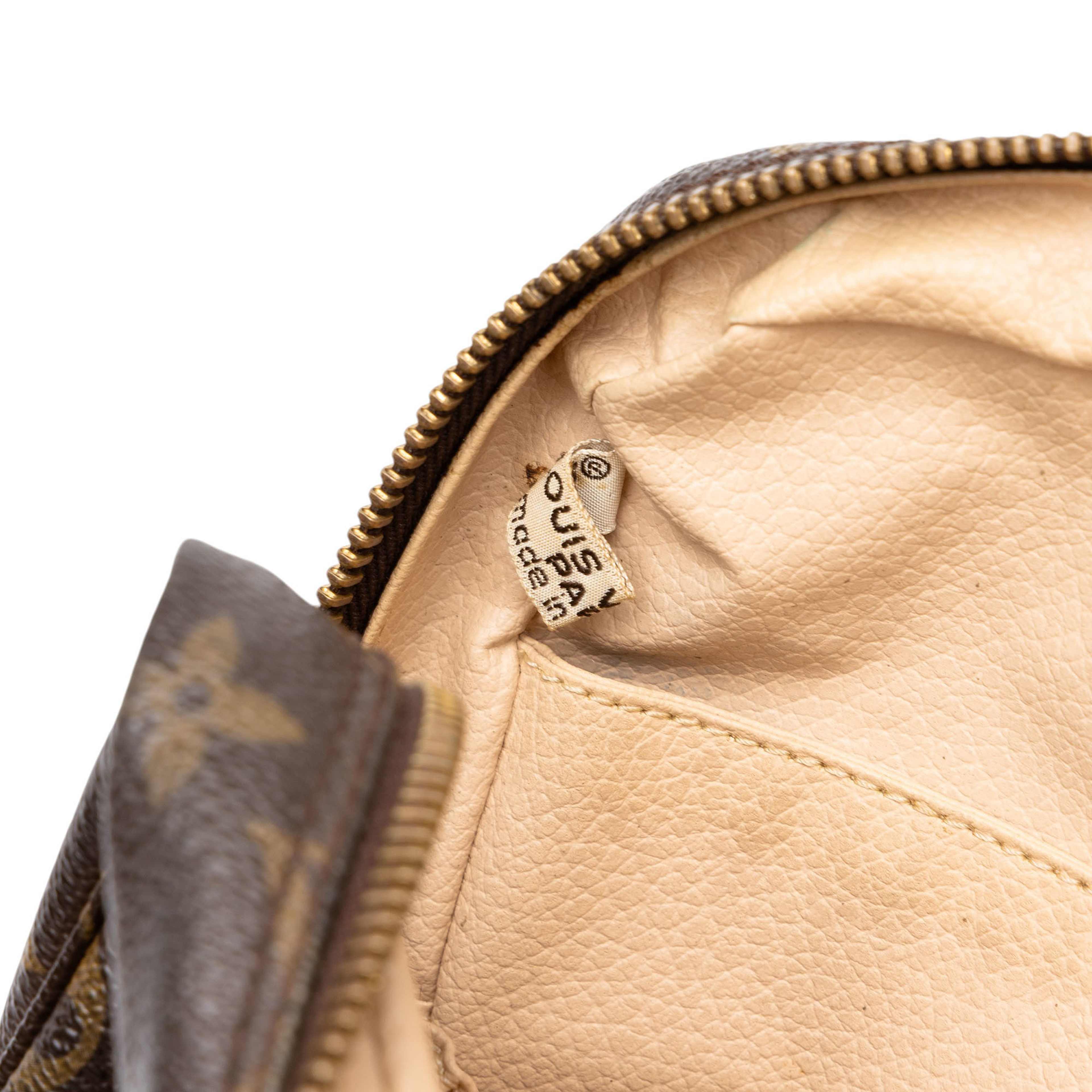 Louis Vuitton Monogram Trousse Toilette 23, från Luxclusif, i färgen brun. Klicka för att öppna bilden i stort format