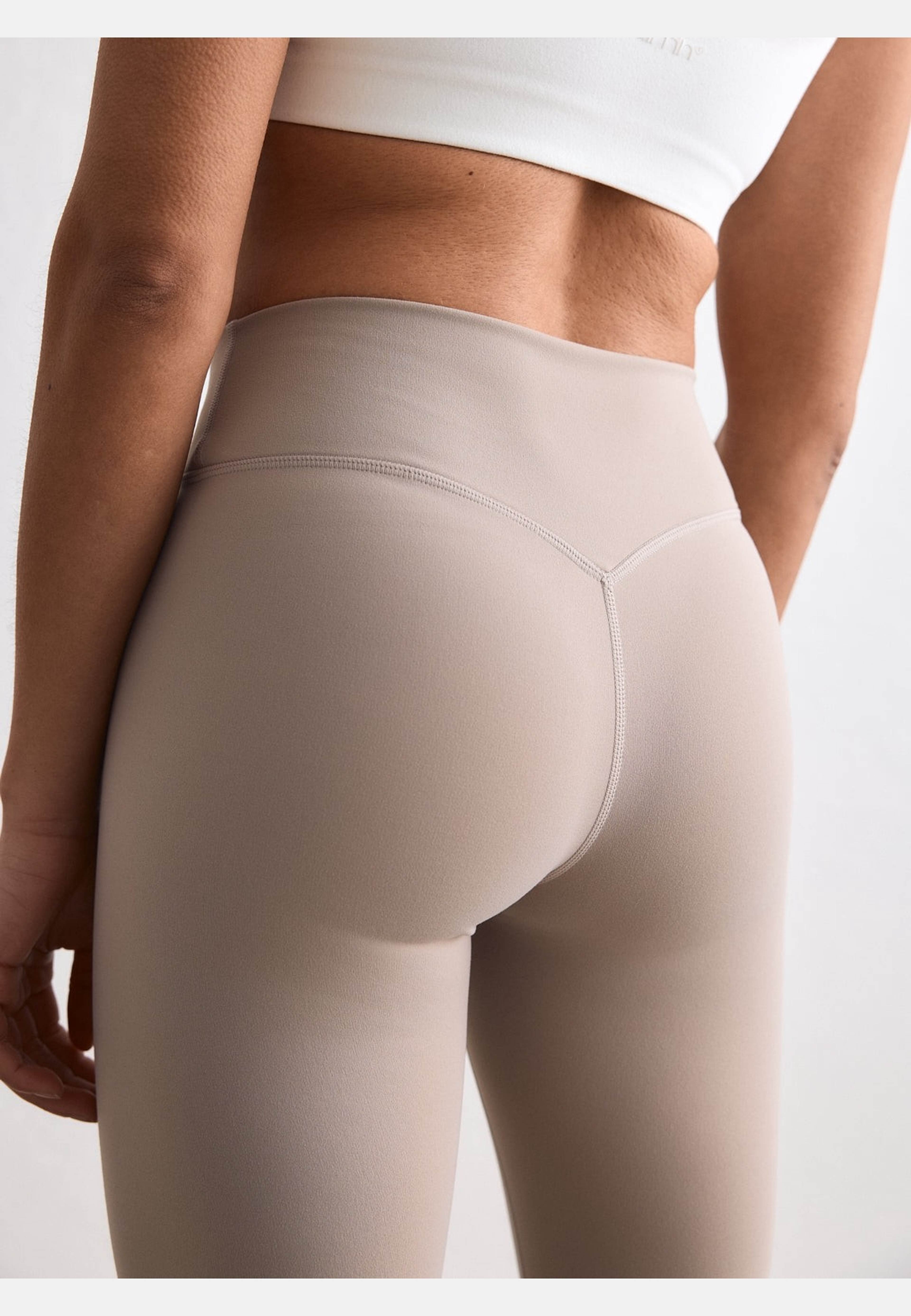 Sense Mid Waist Flare Tights, från aim'n, i färgen dark clay. Klicka för att öppna bilden i stort format