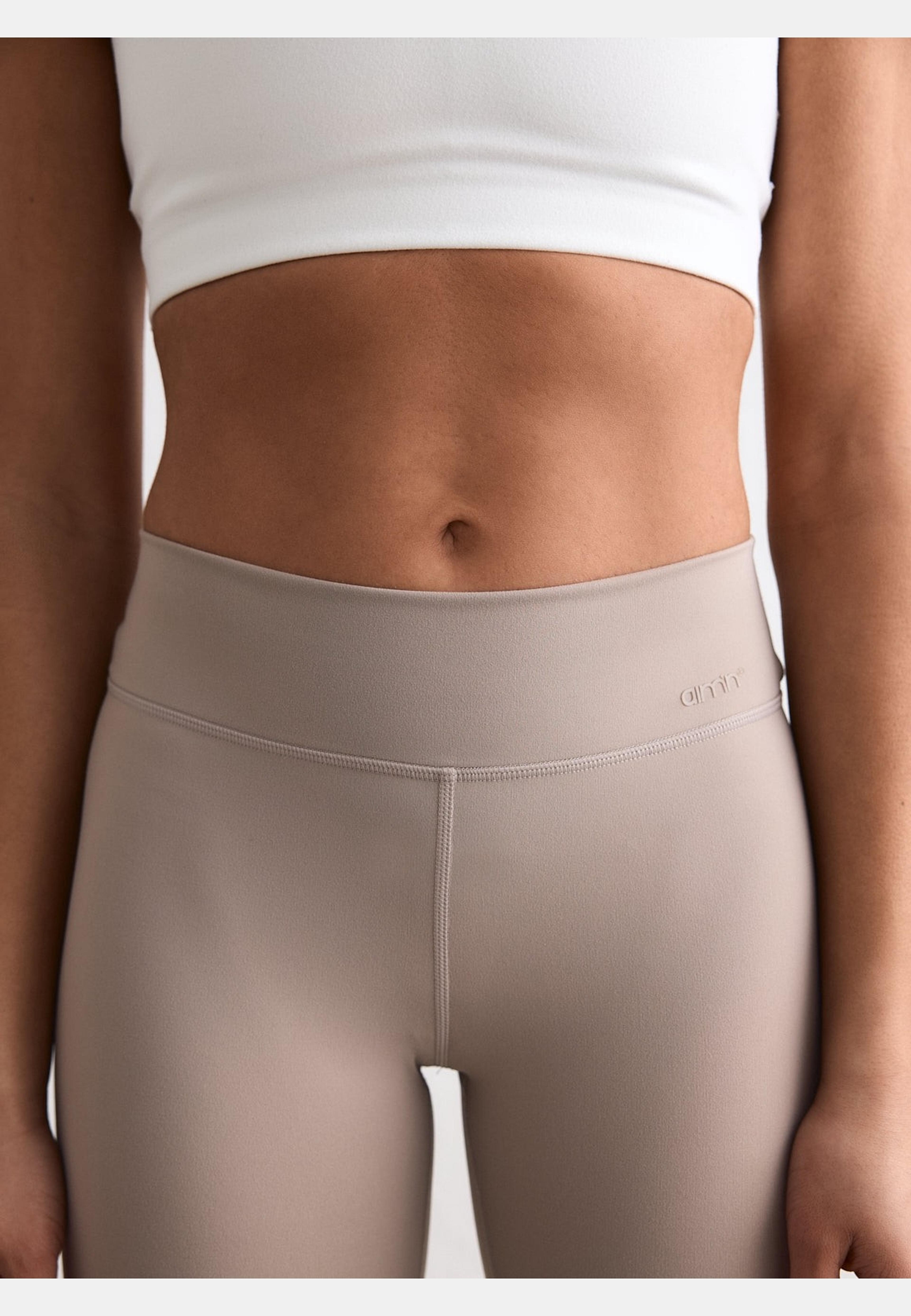 Sense Mid Waist Flare Tights, från aim'n, i färgen dark clay. Klicka för att öppna bilden i stort format