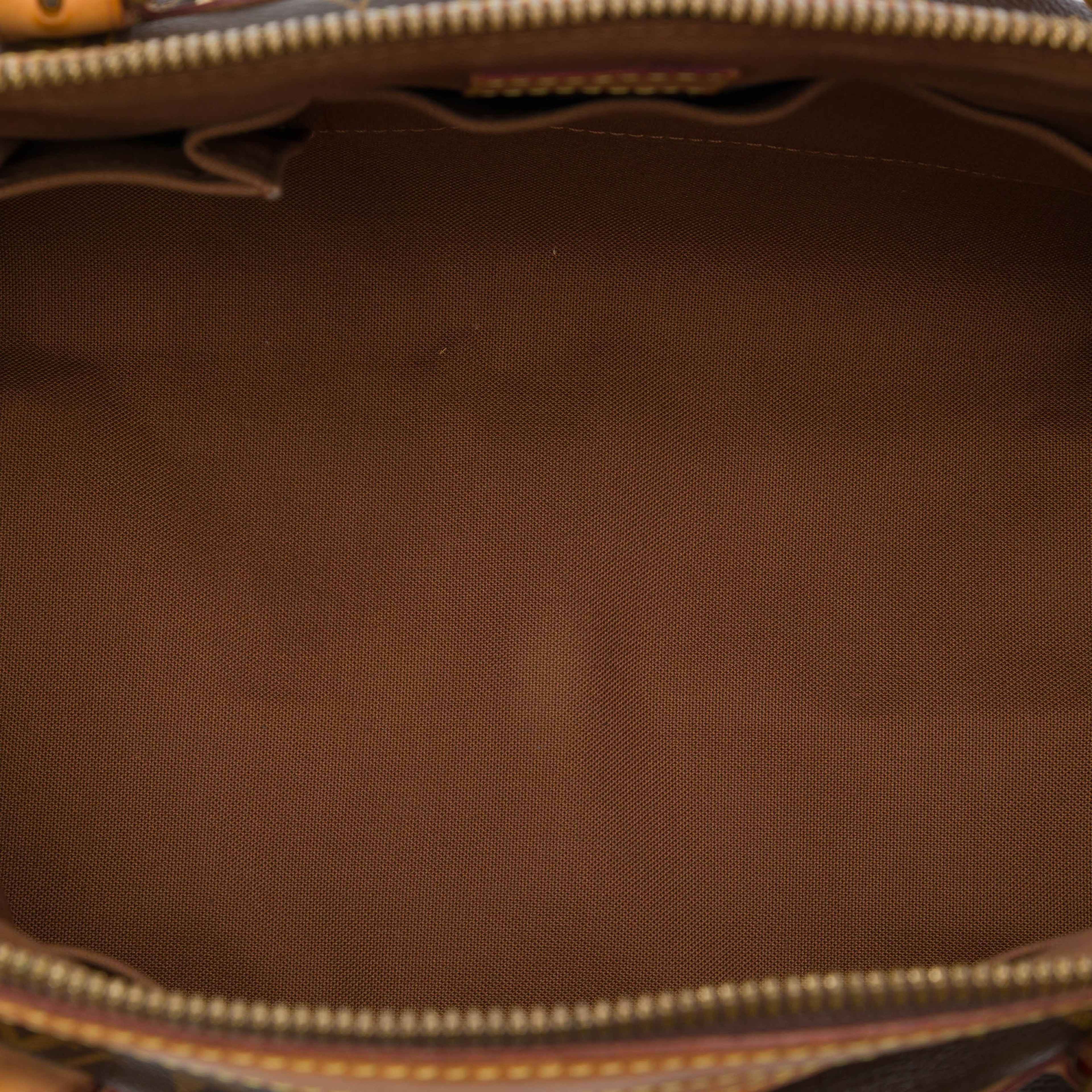 Louis Vuitton Monogram Tivoli Gm, från Luxclusif, i färgen brun. Klicka för att öppna bilden i stort format