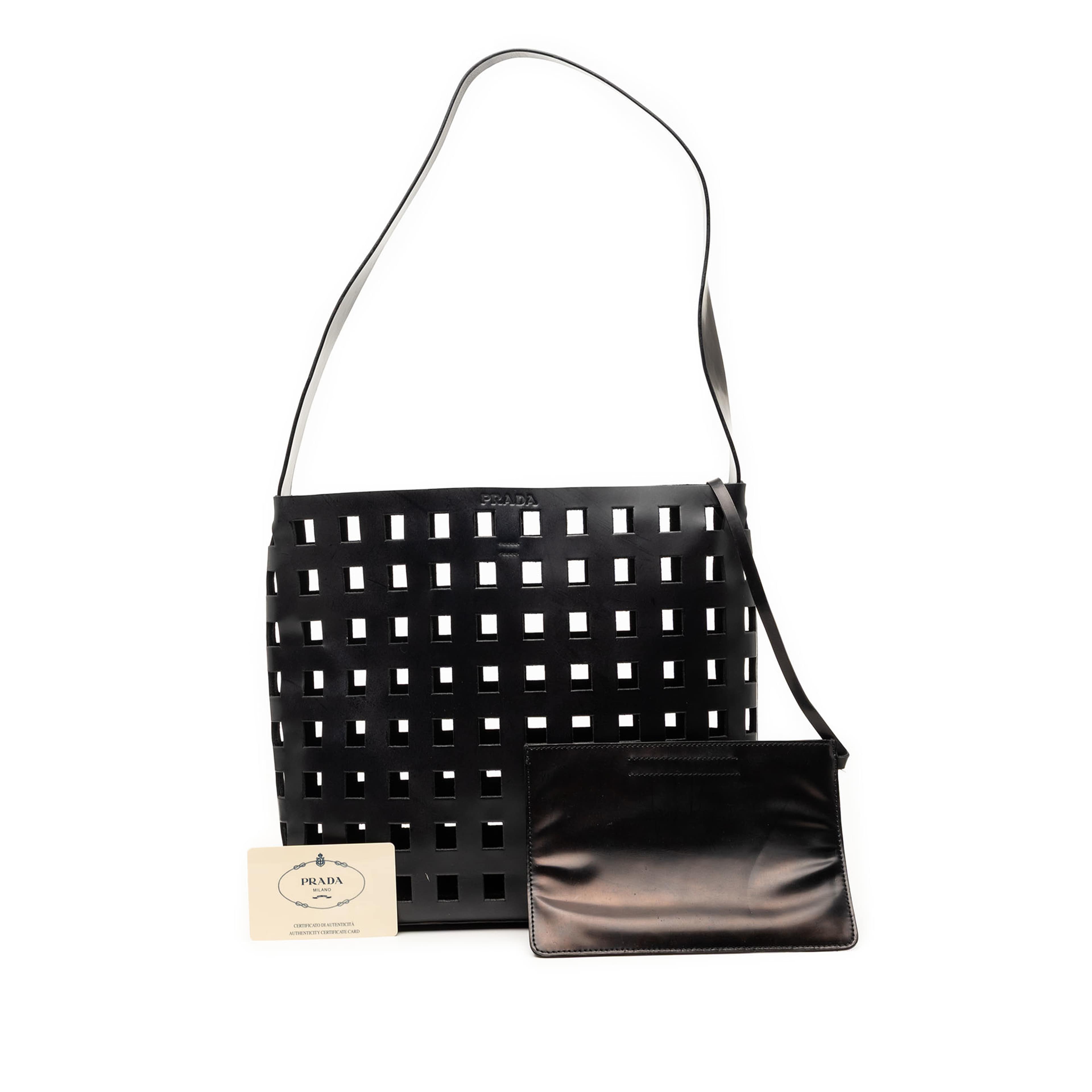 Prada Perforated Leather Shoulder Bag, från Luxclusif, i färgen svart. Klicka för att öppna bilden i stort format