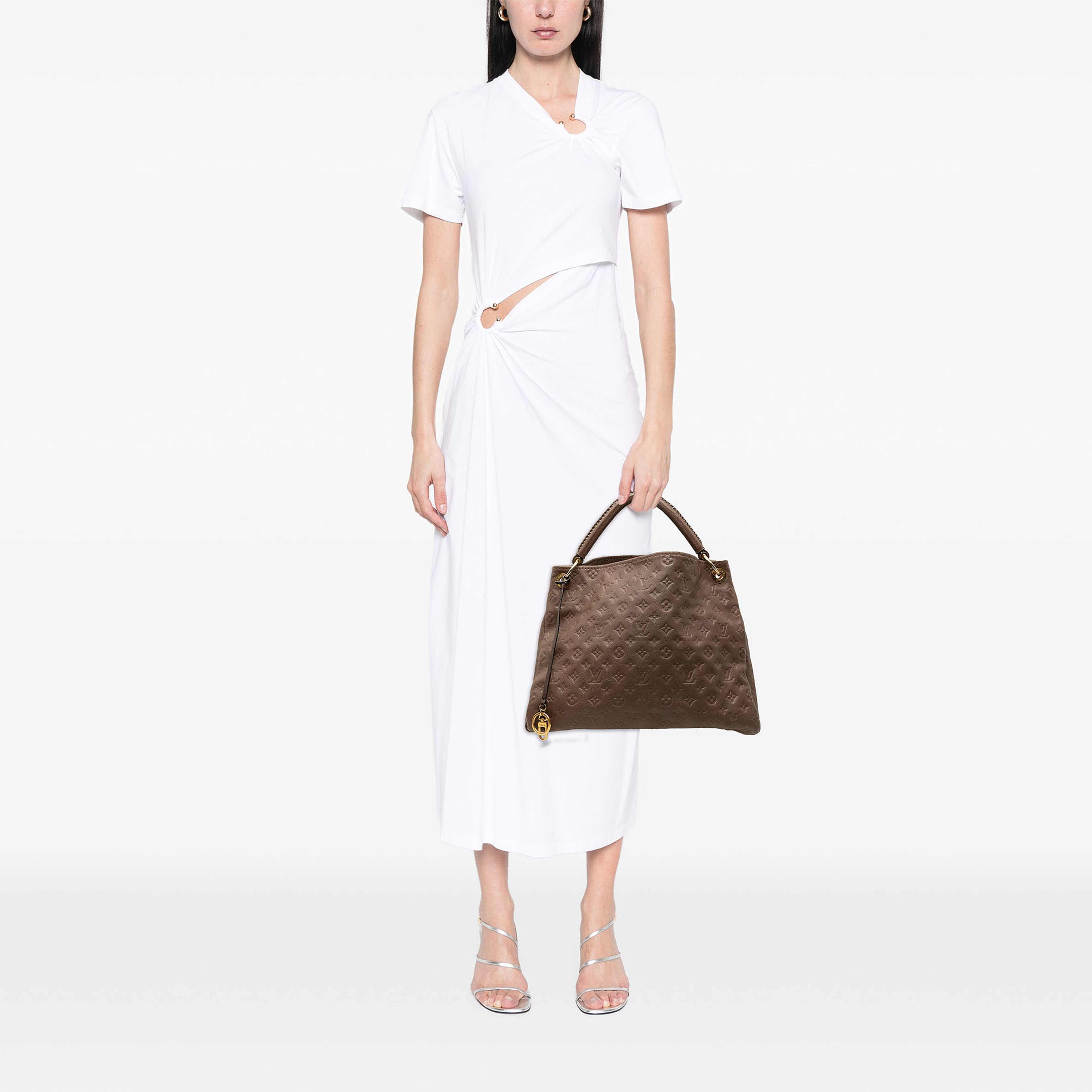 Louis Vuitton Monogram Empreinte Artsy Mm, från Luxclusif, i färgen brun. Klicka för att öppna bilden i stort format