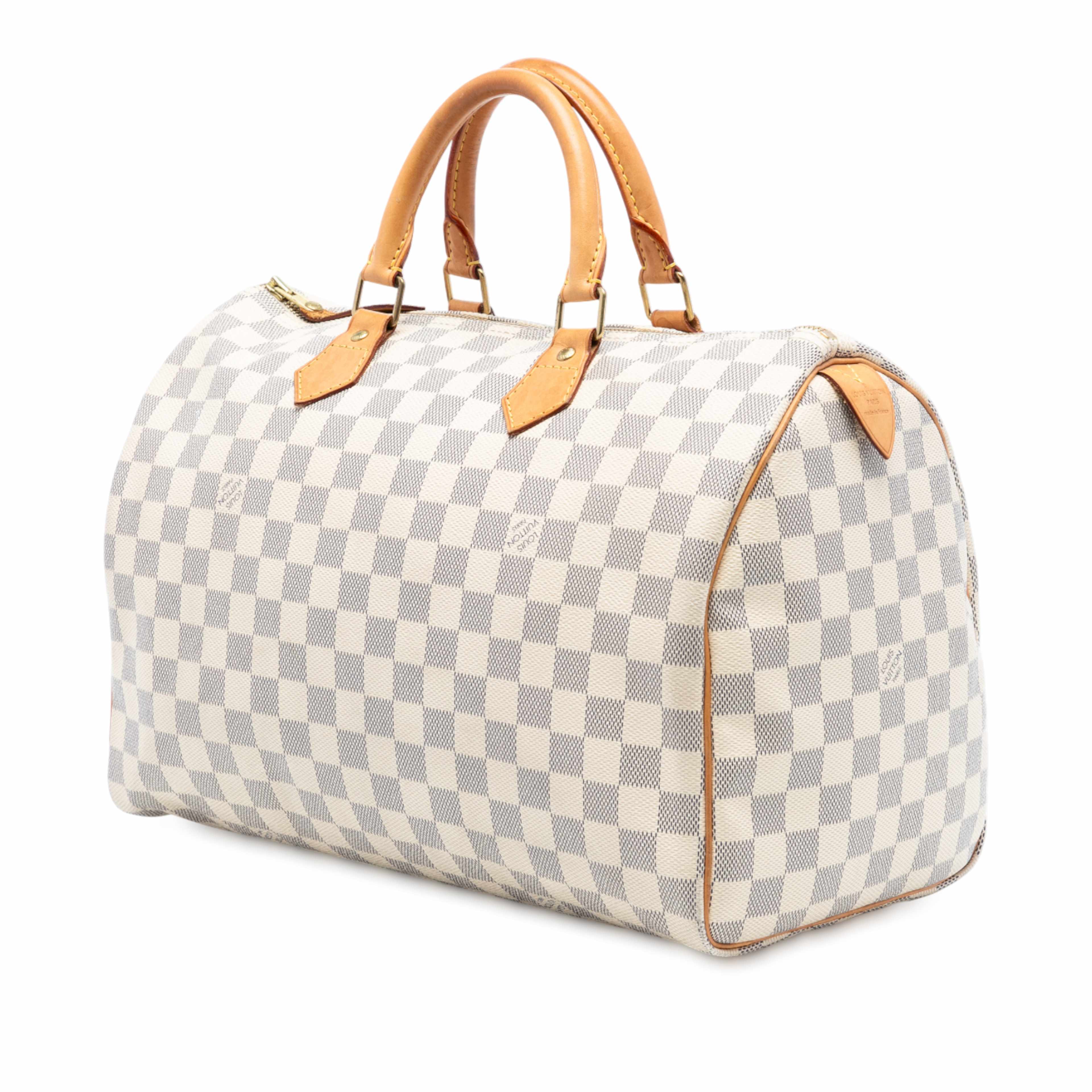 Louis Vuitton Damier Azur Speedy 35, från Luxclusif, i färgen white. Klicka för att öppna bilden i stort format