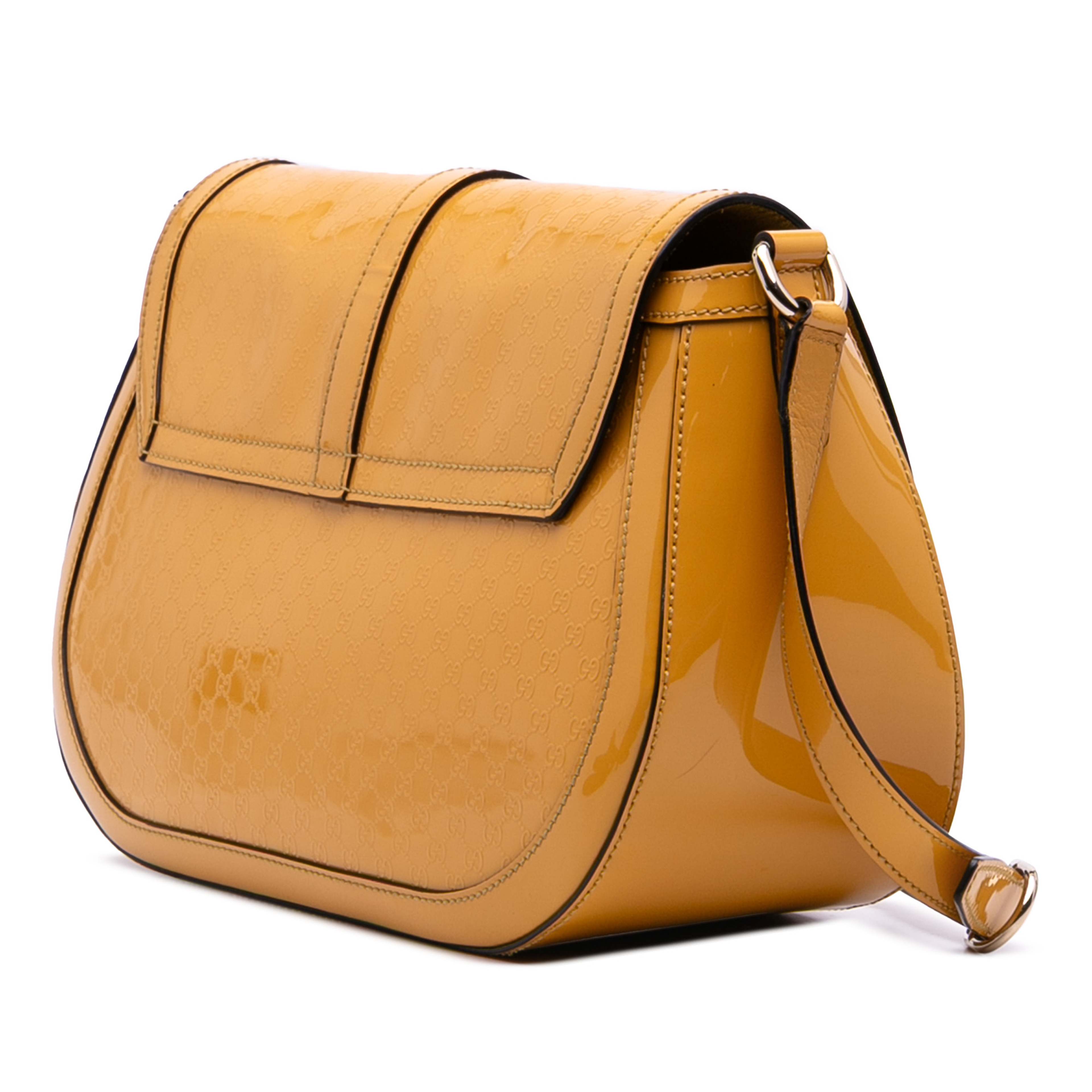 Gucci Microguccissima Patent Stirrup Crossbody, från Luxclusif, i färgen yellow. Klicka för att öppna bilden i stort format
