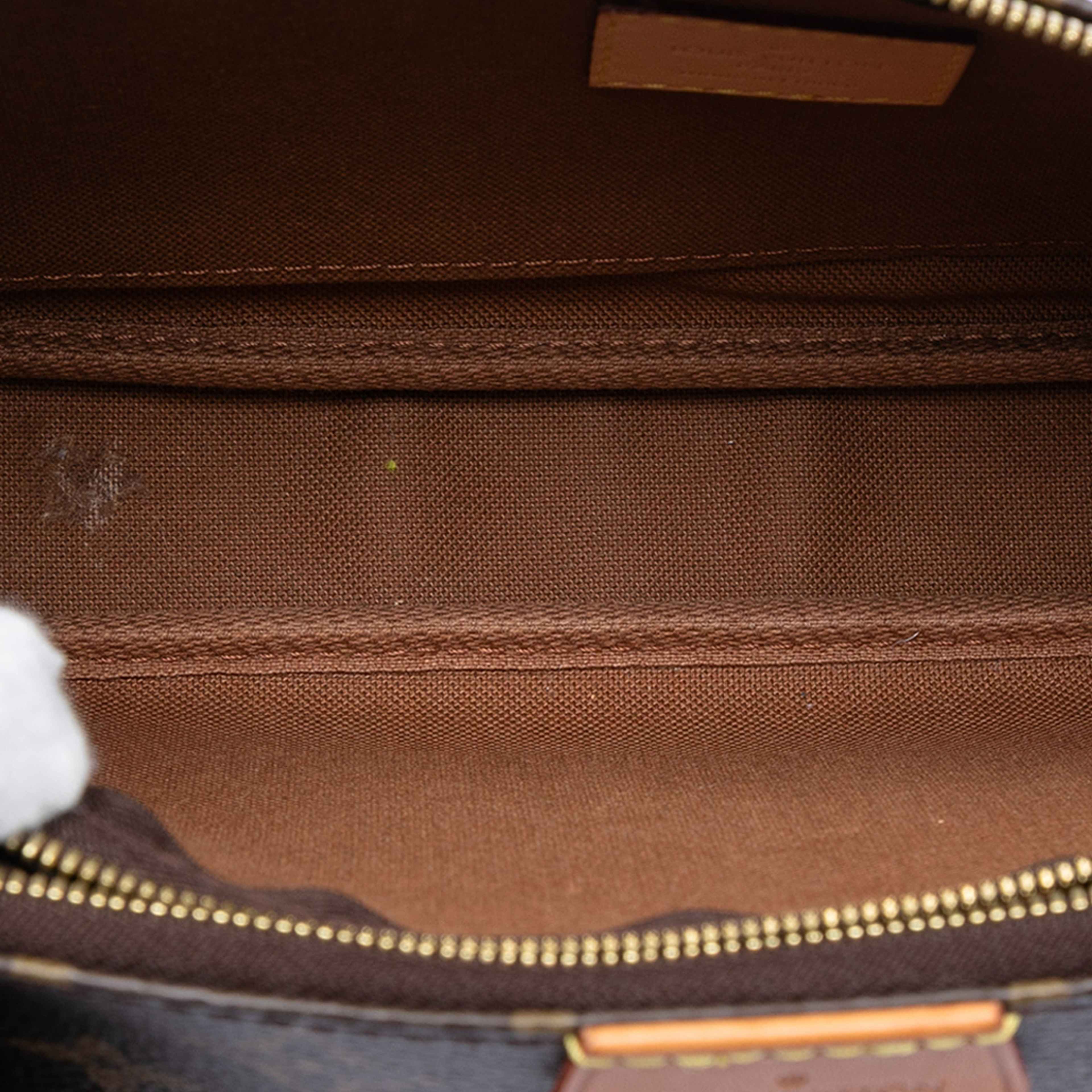 Louis Vuitton Monogram Multi Pochette Accessoires, från Luxclusif, i färgen brown. Klicka för att öppna bilden i stort format