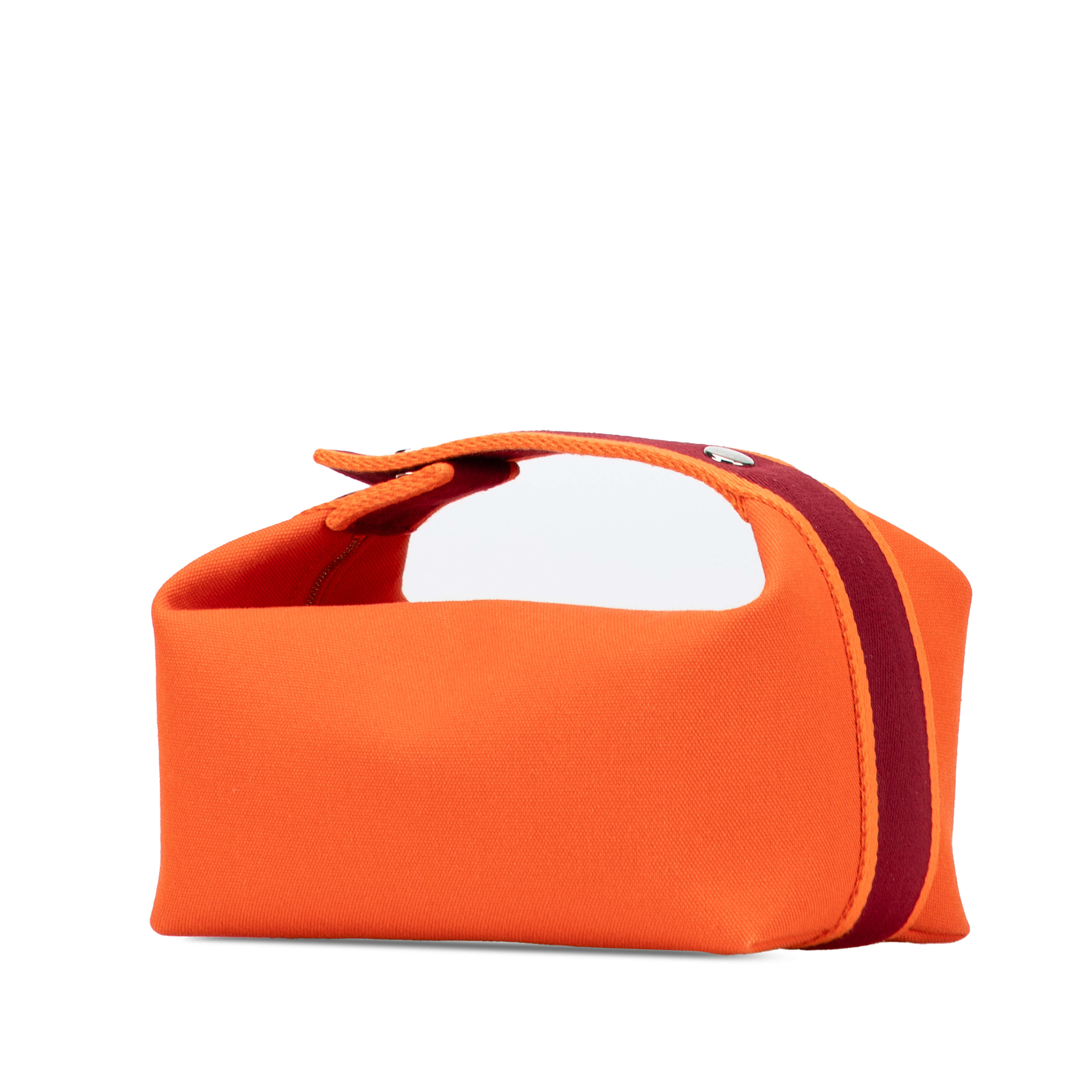 Hermès Small Toile Bride A Brac Case, från Luxclusif, i färgen dark orange. Klicka för att öppna bilden i stort format