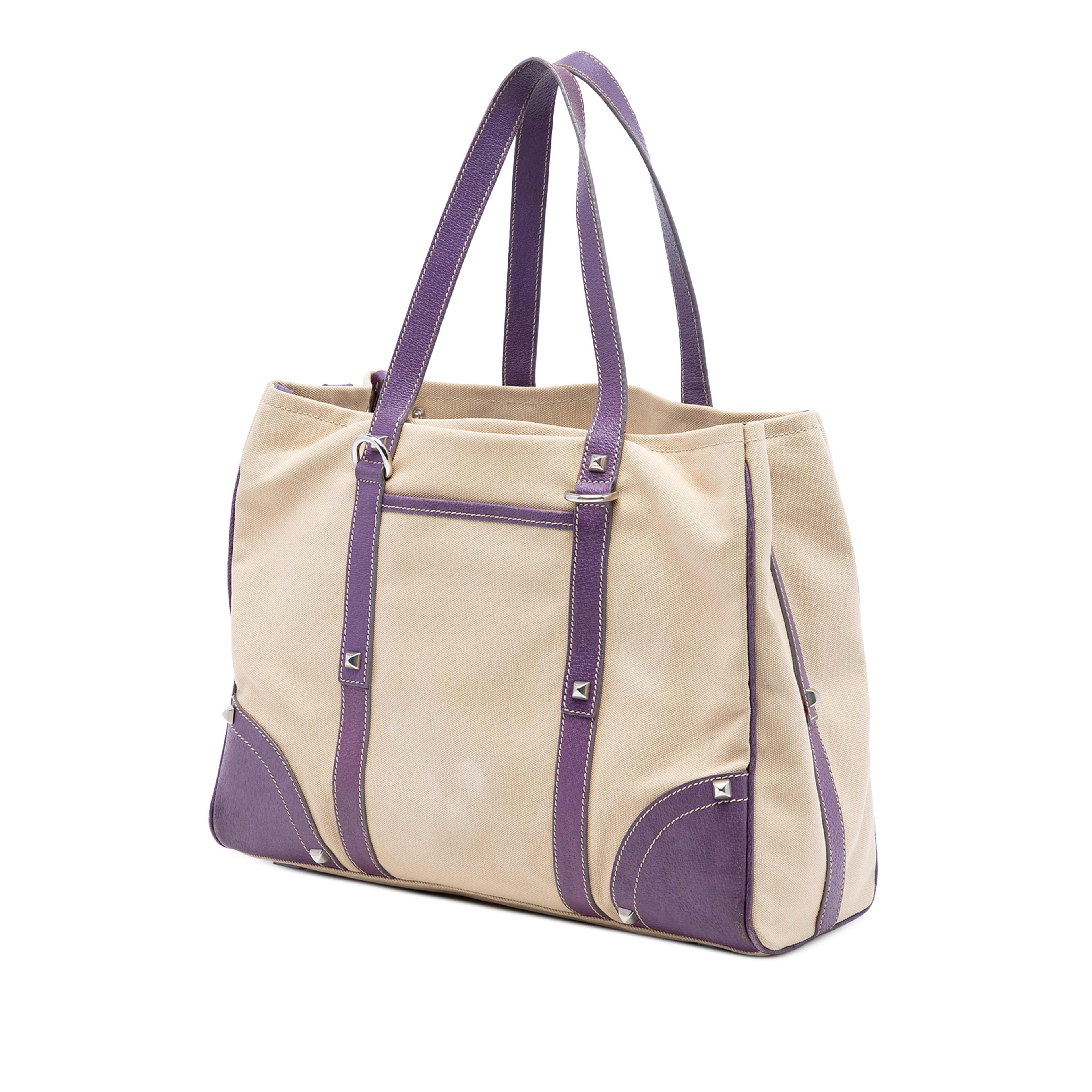 Prada Studded Leather Trimmed Canvas Front Pocket Tote, från Luxclusif, i färgen brun. Klicka för att öppna bilden i stort format