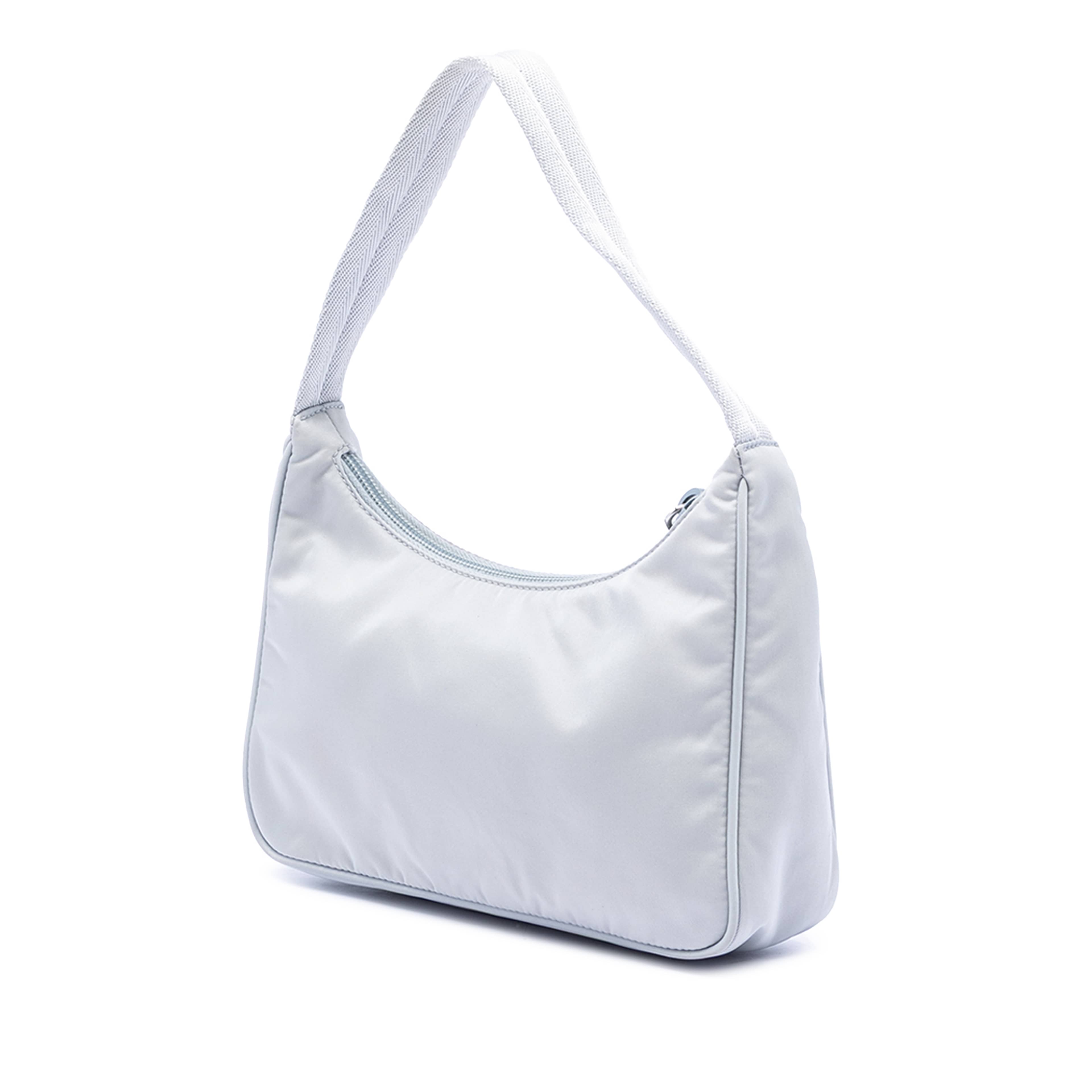 Prada Mini Tessuto Re Edition 2000 Shoulder Bag, från Luxclusif, i färgen light blue. Klicka för att öppna bilden i stort format