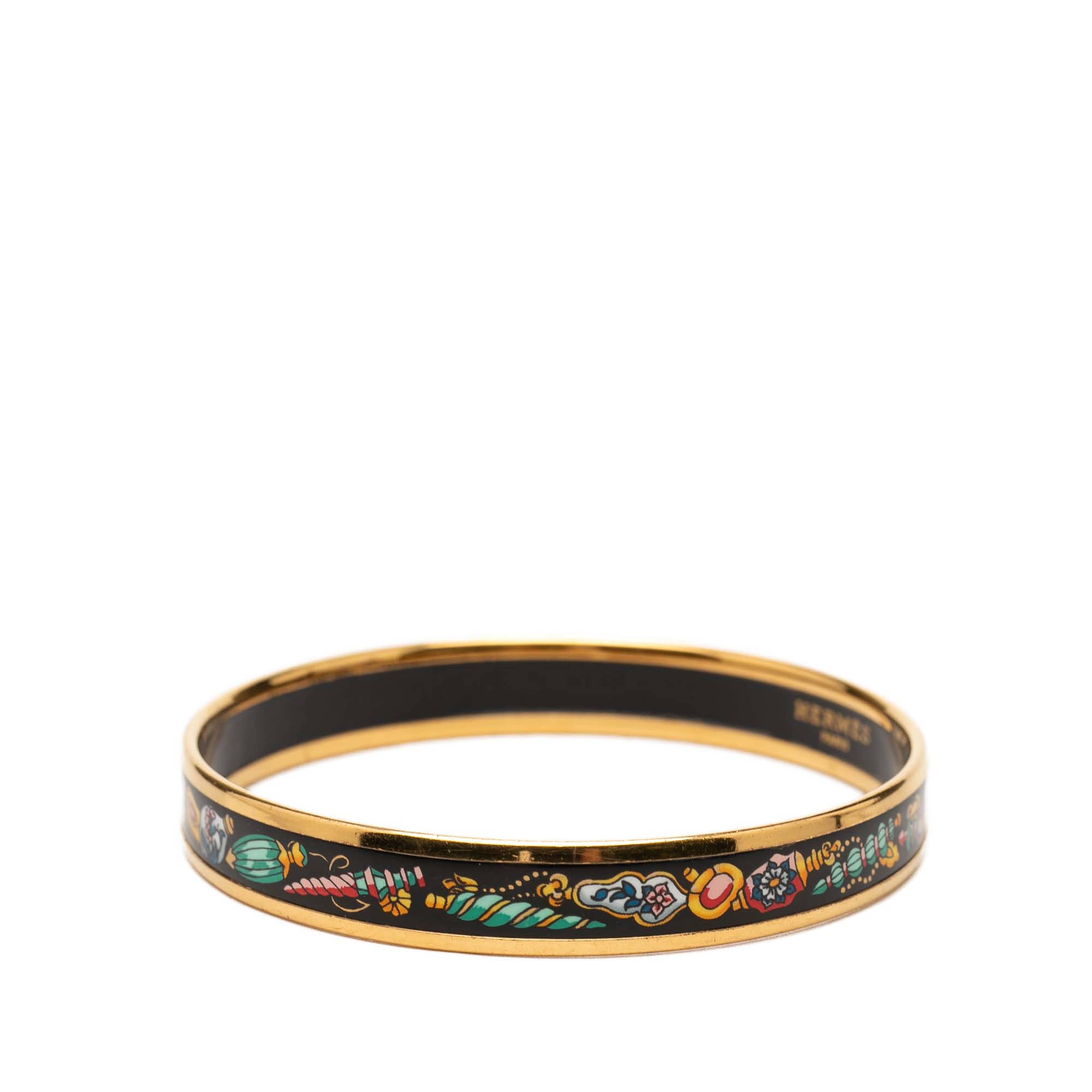 Hermès Narrow Qu Importe Le Flacon Enamel Bangle 62, från Luxclusif, i färgen black. Klicka för att öppna bilden i stort format