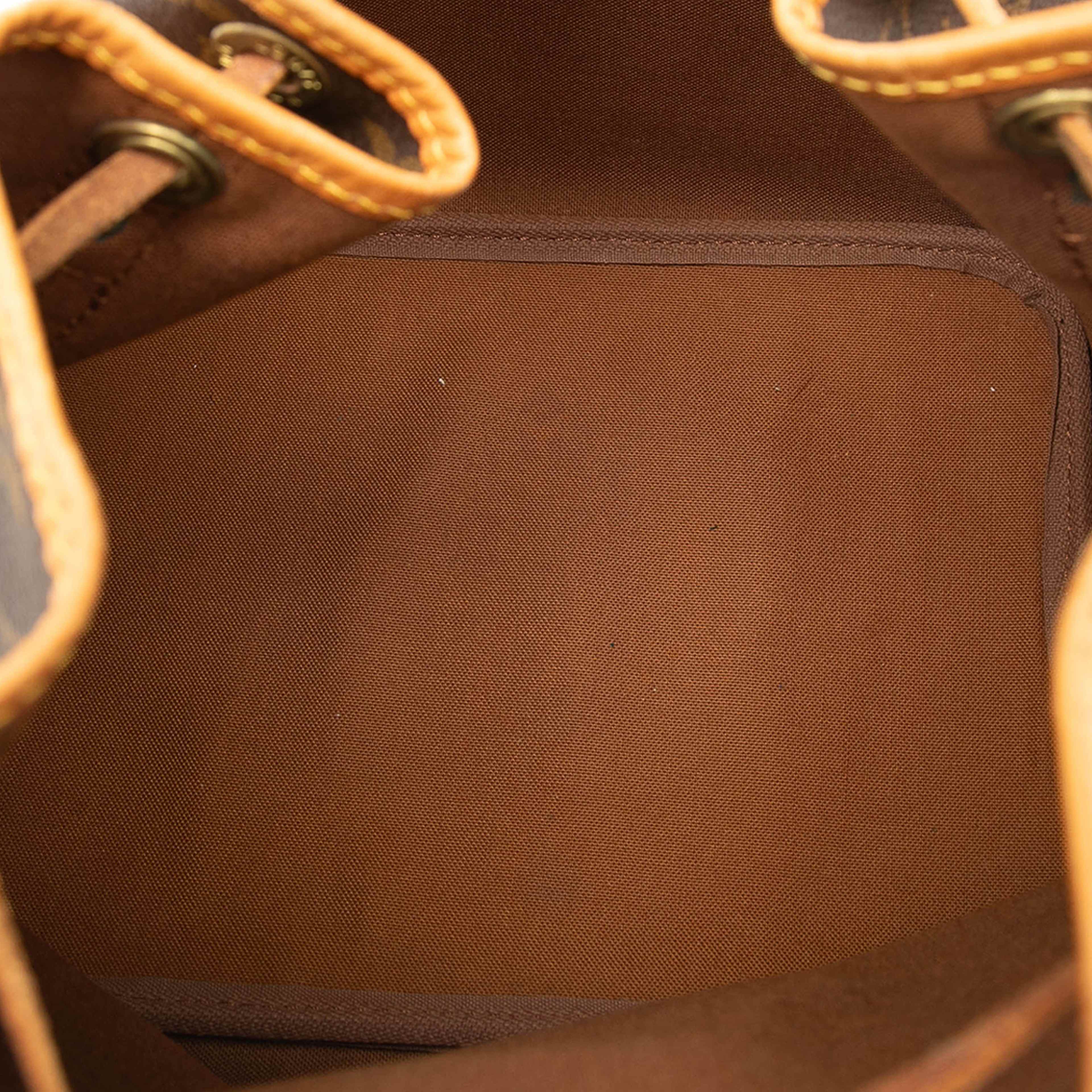 Louis Vuitton Monogram Petit Noe, från Luxclusif, i färgen brun. Klicka för att öppna bilden i stort format