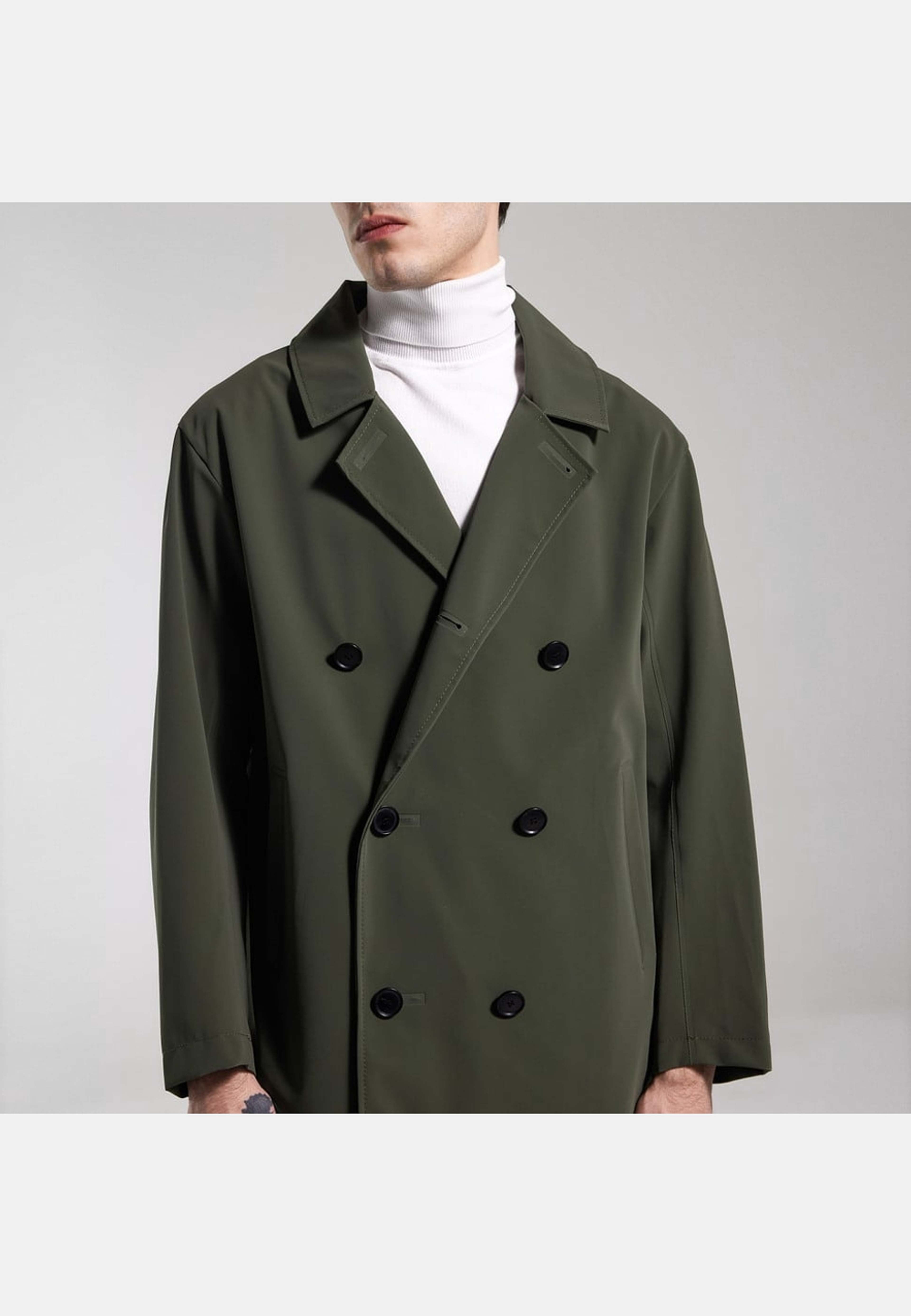 Åtvidaberg Raincoat, från Stutterheim, i färgen green. Klicka för att öppna bilden i stort format