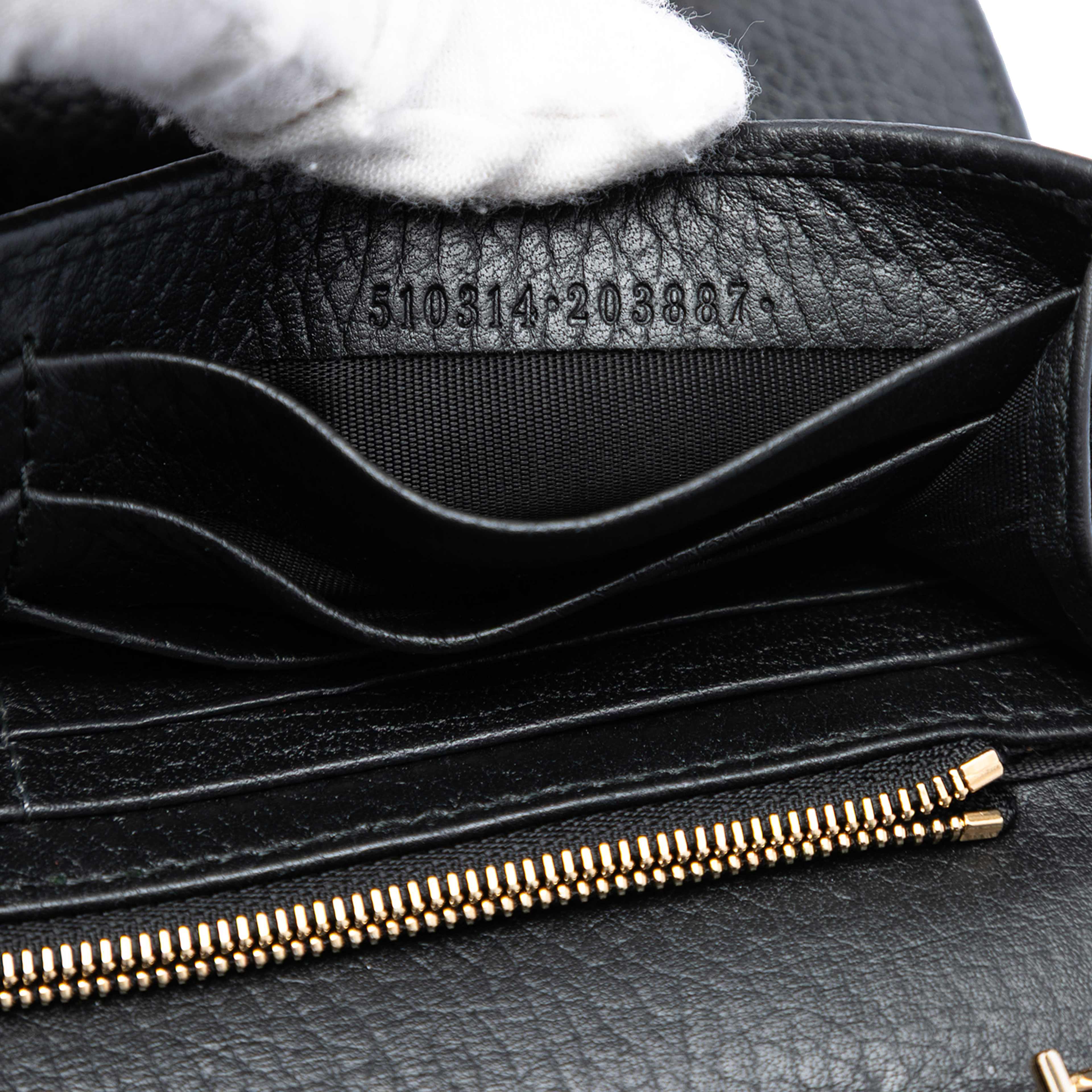Gucci Dollar Calfskin Interlocking G Wallet On Chain, från Luxclusif, i färgen svart. Klicka för att öppna bilden i stort format
