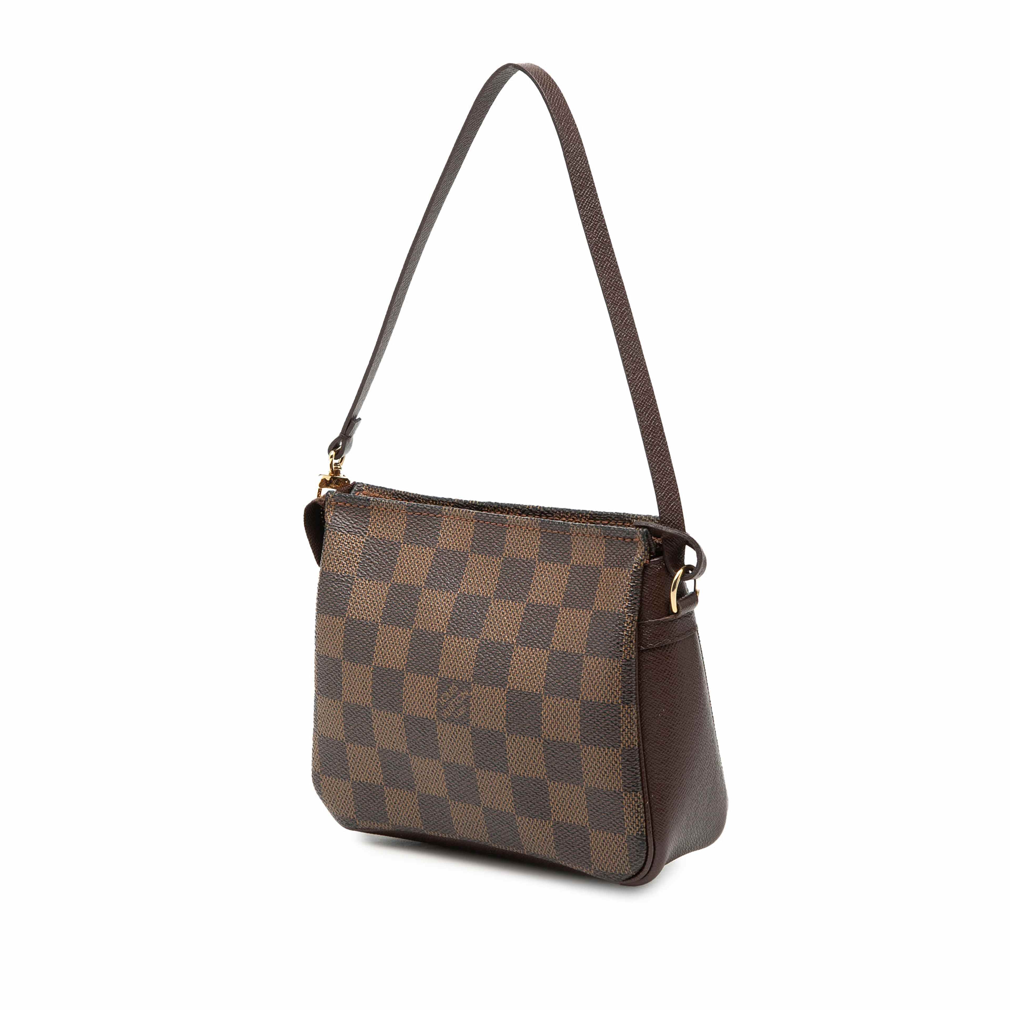 Louis Vuitton Damier Ebene Trousse Pochette, från Luxclusif, i färgen brun. Klicka för att öppna bilden i stort format