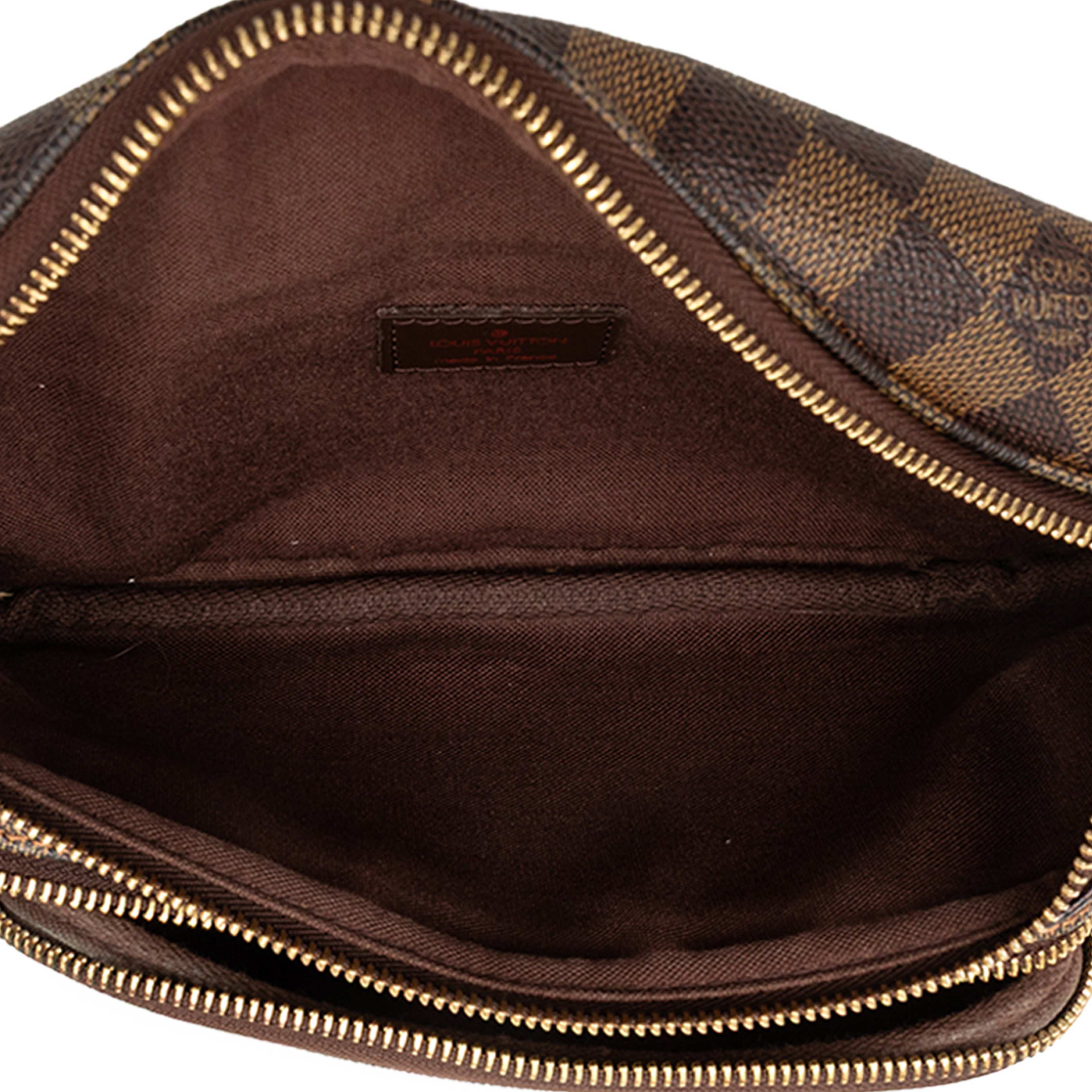 Louis Vuitton Damier Ebene Melville Bum Bag, från Luxclusif, i färgen brun. Klicka för att öppna bilden i stort format