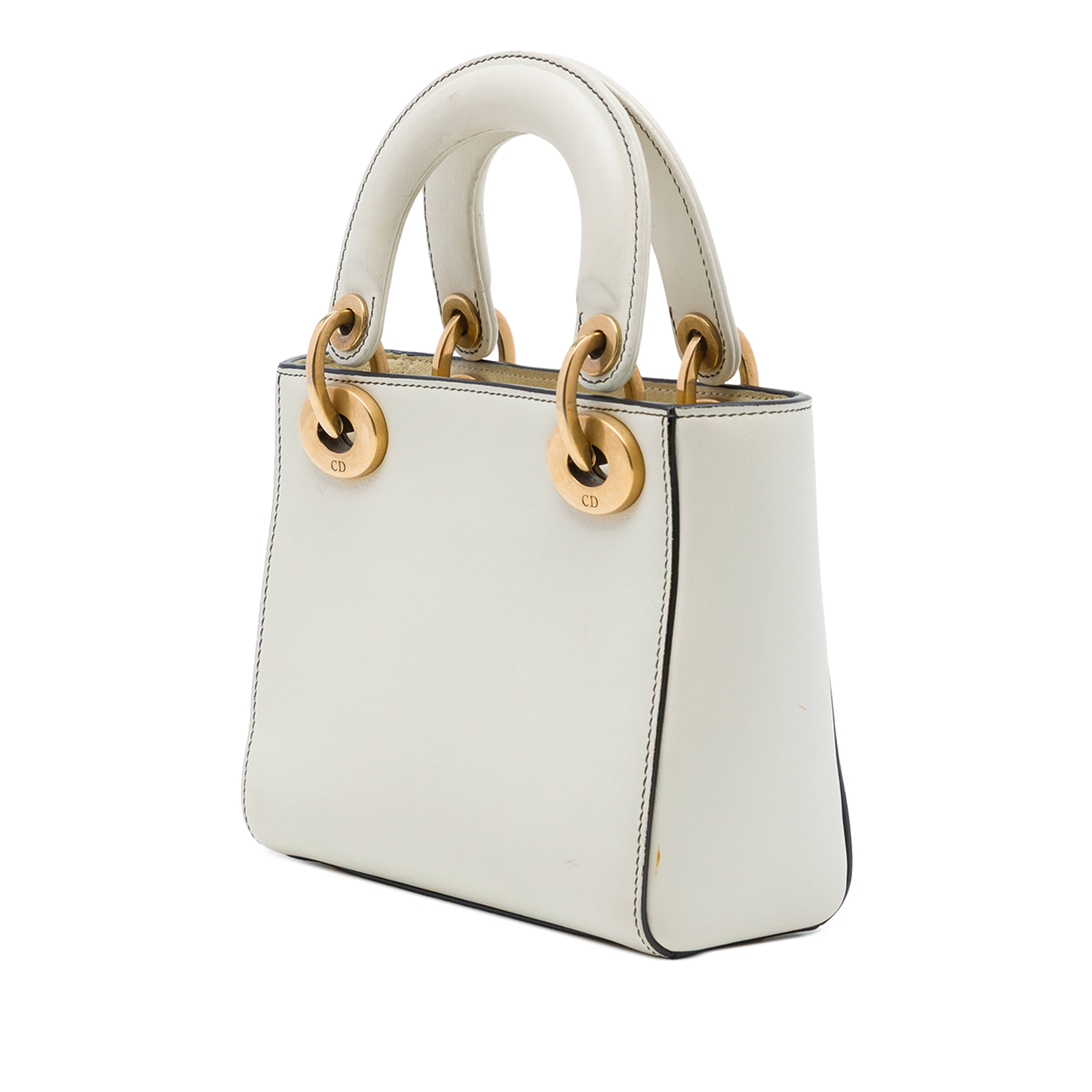 Dior Dioramour Niki De Saint Phalle Mini Calfskin Love Lady Dior, från Luxclusif, i färgen vit. Klicka för att öppna bilden i stort format
