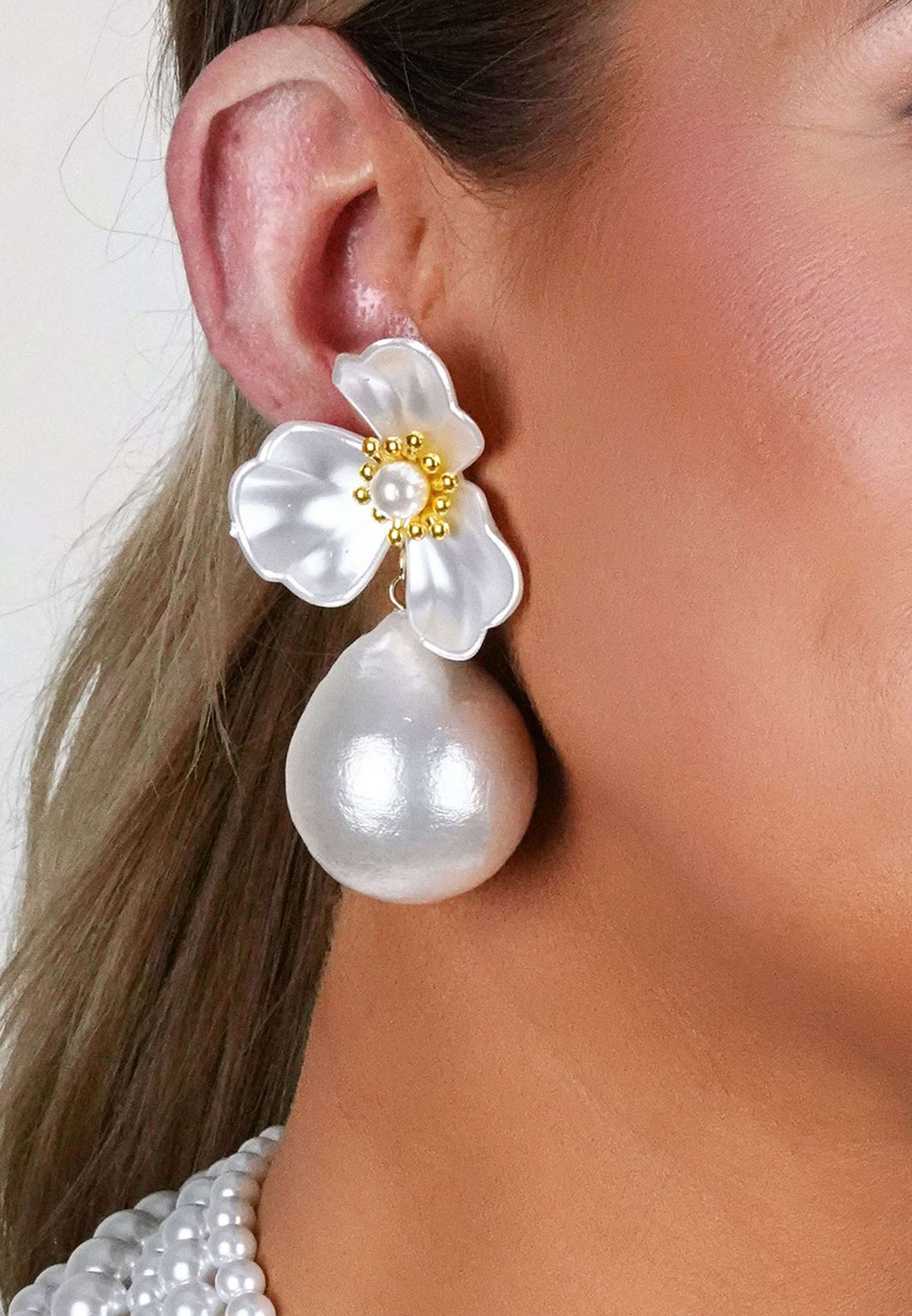 Snö Icon Flower Ear, från SNÖ of Sweden, i färgen g/white. Klicka för att öppna bilden i stort format