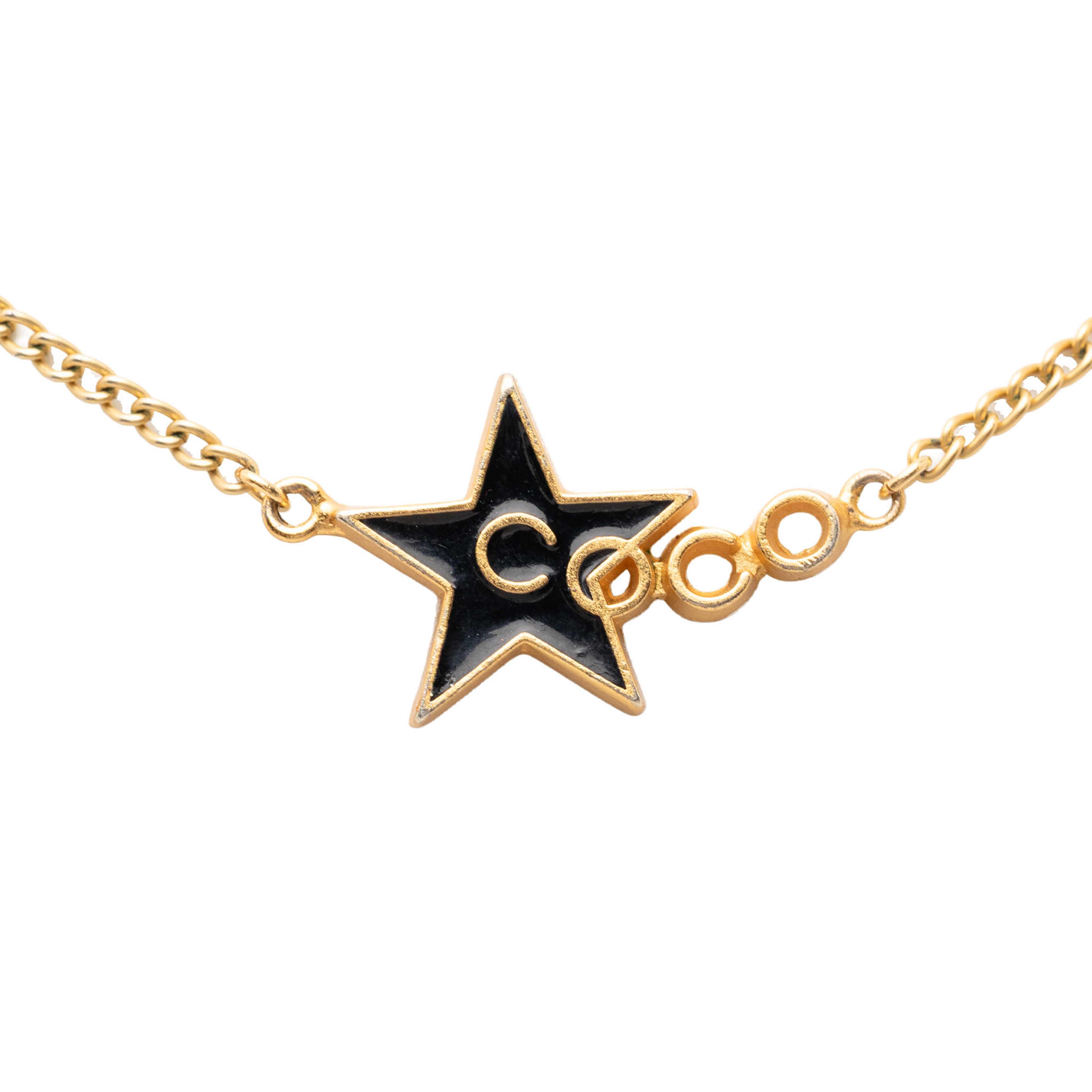 Chanel Gold Plated Enamel Coco Star Pendant Necklace, från Luxclusif, i färgen guld. Klicka för att öppna bilden i stort format